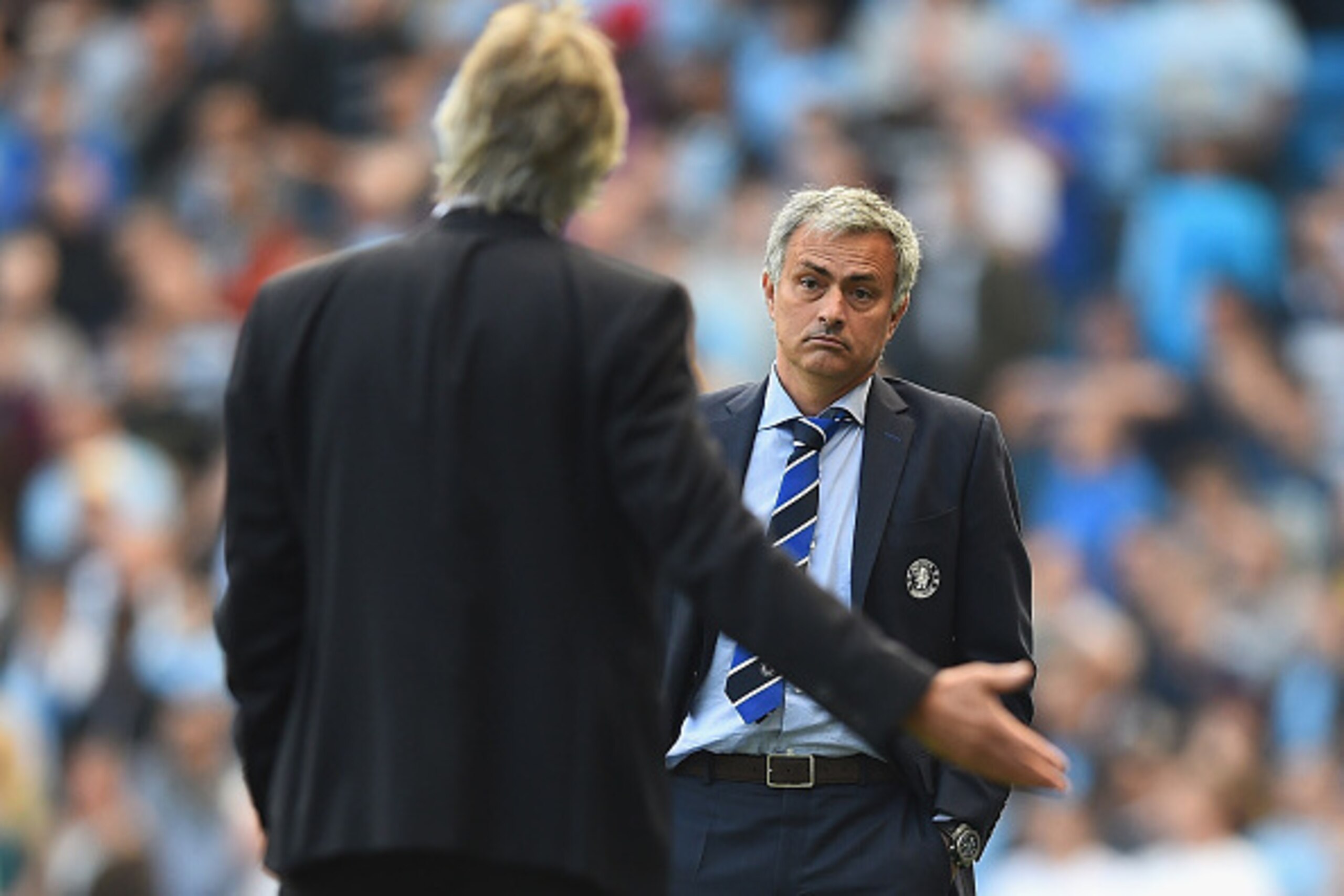 MANCHESTER, ENGLAND - SEPTEMBER 21: Jose Mourinho of Chelsea speaks with Manuel Pellegrini of Manchester City during the Barclays Premier League match between Manchester City and Chelsea at Etihad Stadium on September 21, 2014 in Manchester, England.  (Ph