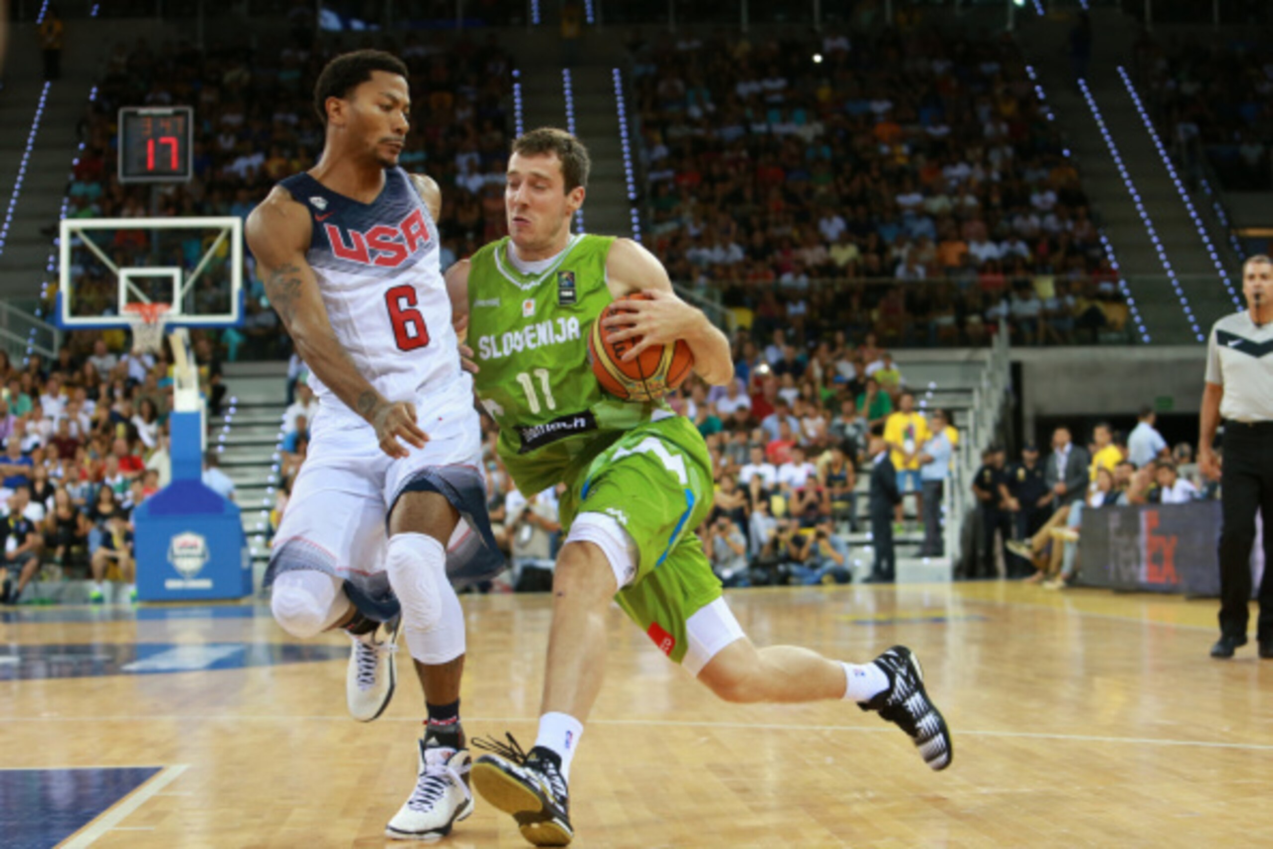 LAS PALMAS, GRAN CANARIA, SPAIN - AUGUST 26: Goran Dragic #11 of the Slovenia Basketball Men's National Team drives against Derrick Rose #6 of the USA Basketball Men's National Team on August 26, 2014 at Gran Canaria Arena in Las Palmas, Gran Canaria, Spa