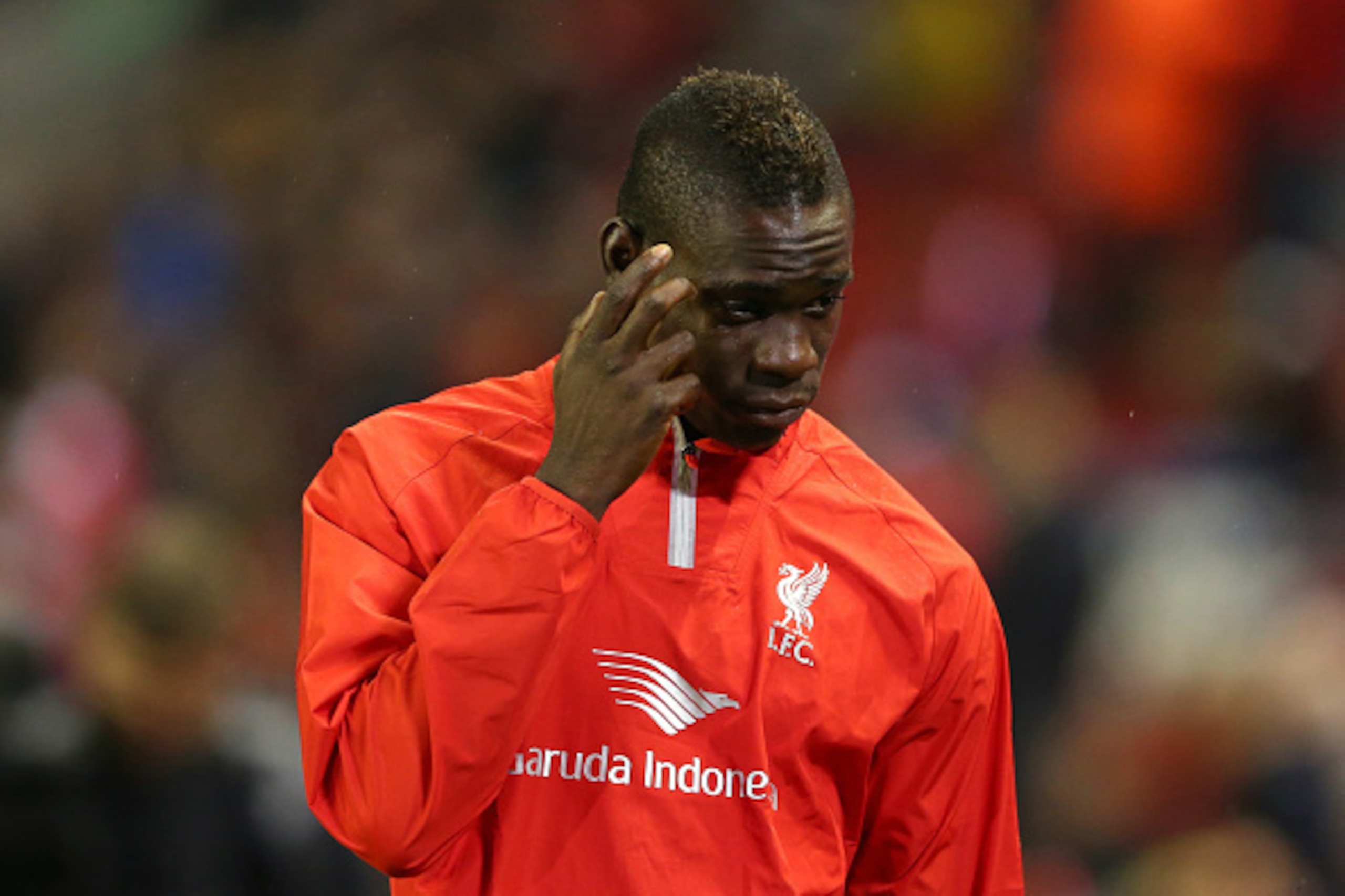 LIVERPOOL, ENGLAND - SEPTEMBER 23:  Mario Balotelli of Liverpool looks on during the warm up prior to the Capital One Cup Third Round match between Liverpool and Middlesbrough at Anfield on September 23, 2014 in Liverpool, England.  (Photo by Alex Livesey