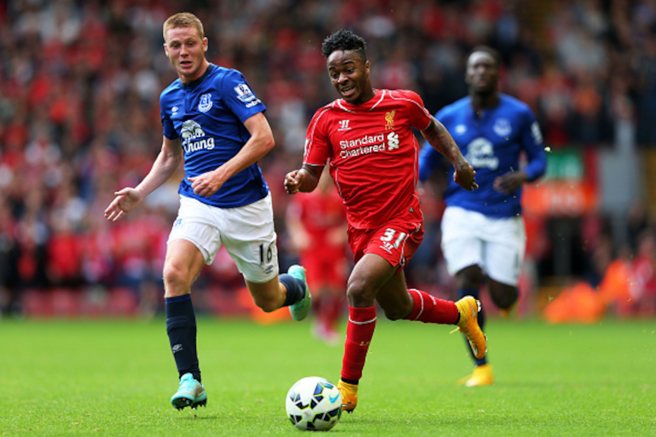 LIVERPOOL, ENGLAND - SEPTEMBER 27: Raheem Sterling of Liverpool is pursued by James McCarthy of Everton during the Barclays Premier League match between Liverpool and Everton at Anfield on September 27, 2014 in Liverpool, England. (Photo by Alex Livesey LIVERPOOL, ENGLAND - SEPTEMBER 27: Raheem Sterling of Liverpool is pursued by James McCarthy of Everton during the Barclays Premier League match between Liverpool and Everton at Anfield on September 27, 2014 in Liverpool, England. (Photo by Alex Livesey