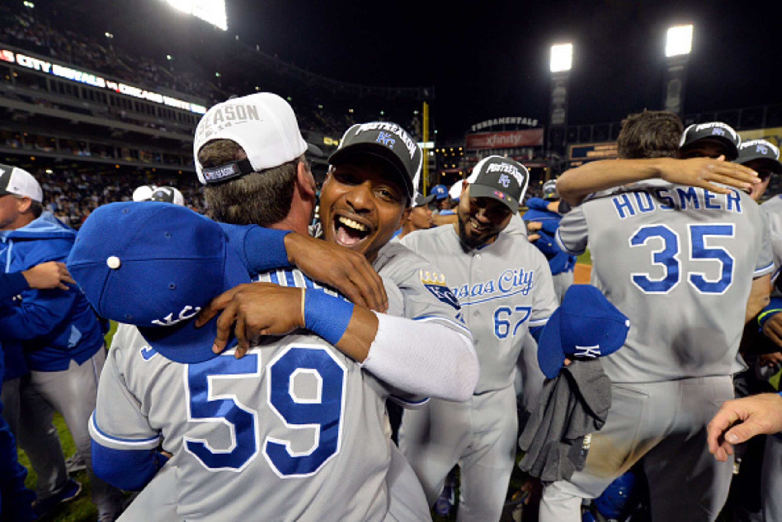CHICAGO, IL - SEPTEMBER 26: Jarrod Dyson #1 of the Kansas City Royals (R) hugs third base coach third base coach Mike Jirschele #59 after defeating the Chicago White Sox to clinch a Wild Card berth at U.S. Cellular Field on September 26, 2014 in Chicago, CHICAGO, IL - SEPTEMBER 26: Jarrod Dyson #1 of the Kansas City Royals (R) hugs third base coach third base coach Mike Jirschele #59 after defeating the Chicago White Sox to clinch a Wild Card berth at U.S. Cellular Field on September 26, 2014 in Chicago,