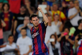 BARCELONA, SPAIN - AUGUST 24:  Lionel Messi of FC Barcelona celebrates scoring  his team's opening goal during the La Liga match between FC Barcelona and Elche FC at Camp Nou stadium on August 24, 2014 in Barcelona, Spain.  (Photo by Denis Doyle/Getty Ima