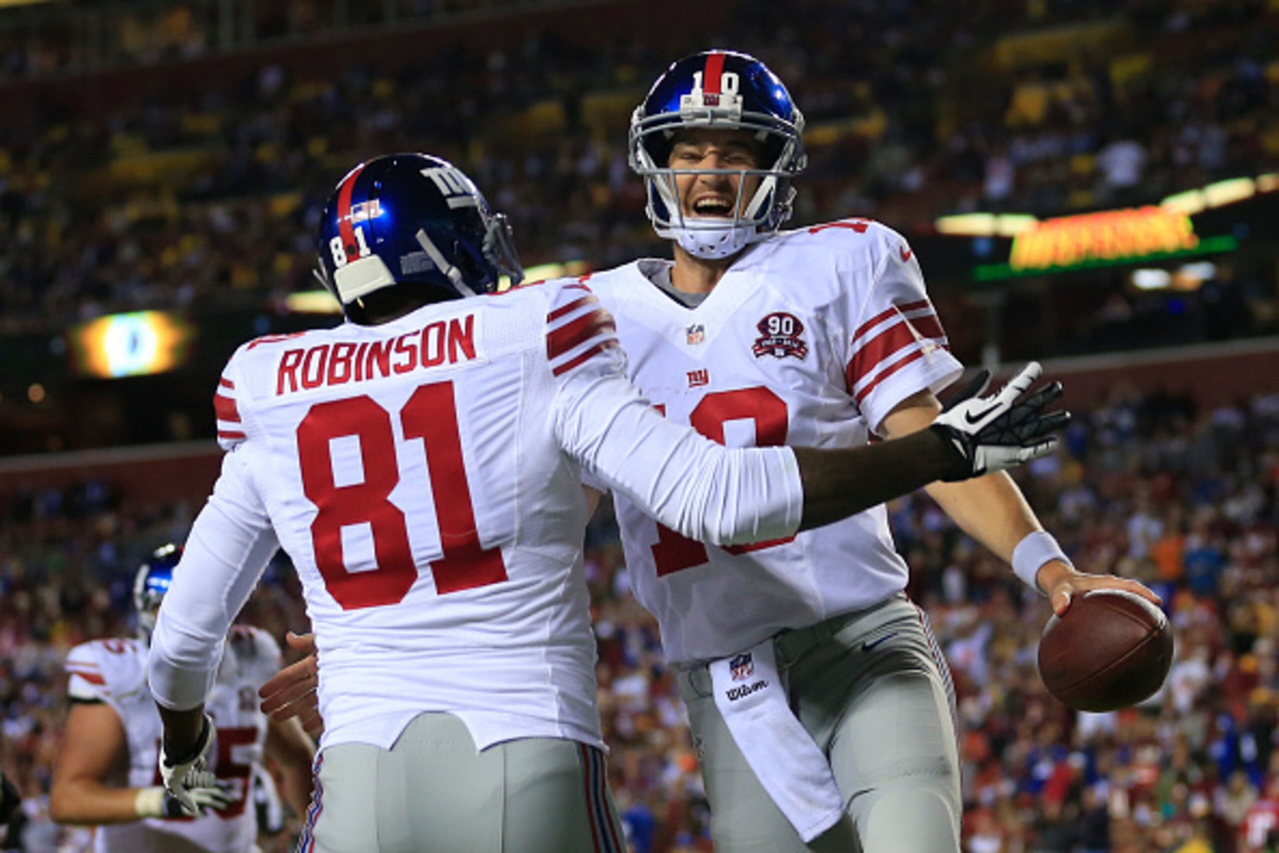 LANDOVER, MD - SEPTEMBER 25: Quarterback Eli Manning #10 of the New York Giants celebrates his 4th quarter touchdown against the Washington Redskins at FedExField on September 25, 2014 in Landover, Maryland. (Photo by Rob Carr/Getty Images)