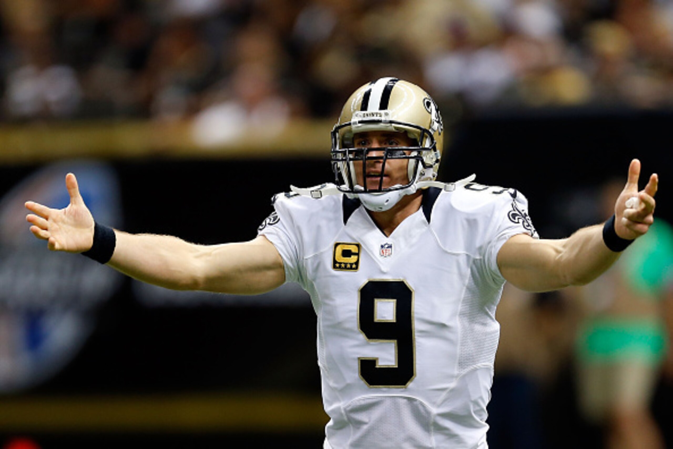 NEW ORLEANS, LA - SEPTEMBER 21:  Drew Brees #9 of the New Orleans Saints reacts to a play against the Minnesota Vikings during the second quarter of a game at the Mercedes-Benz Superdome on September 21, 2014 in New Orleans, Louisiana.  (Photo by Wesley H
