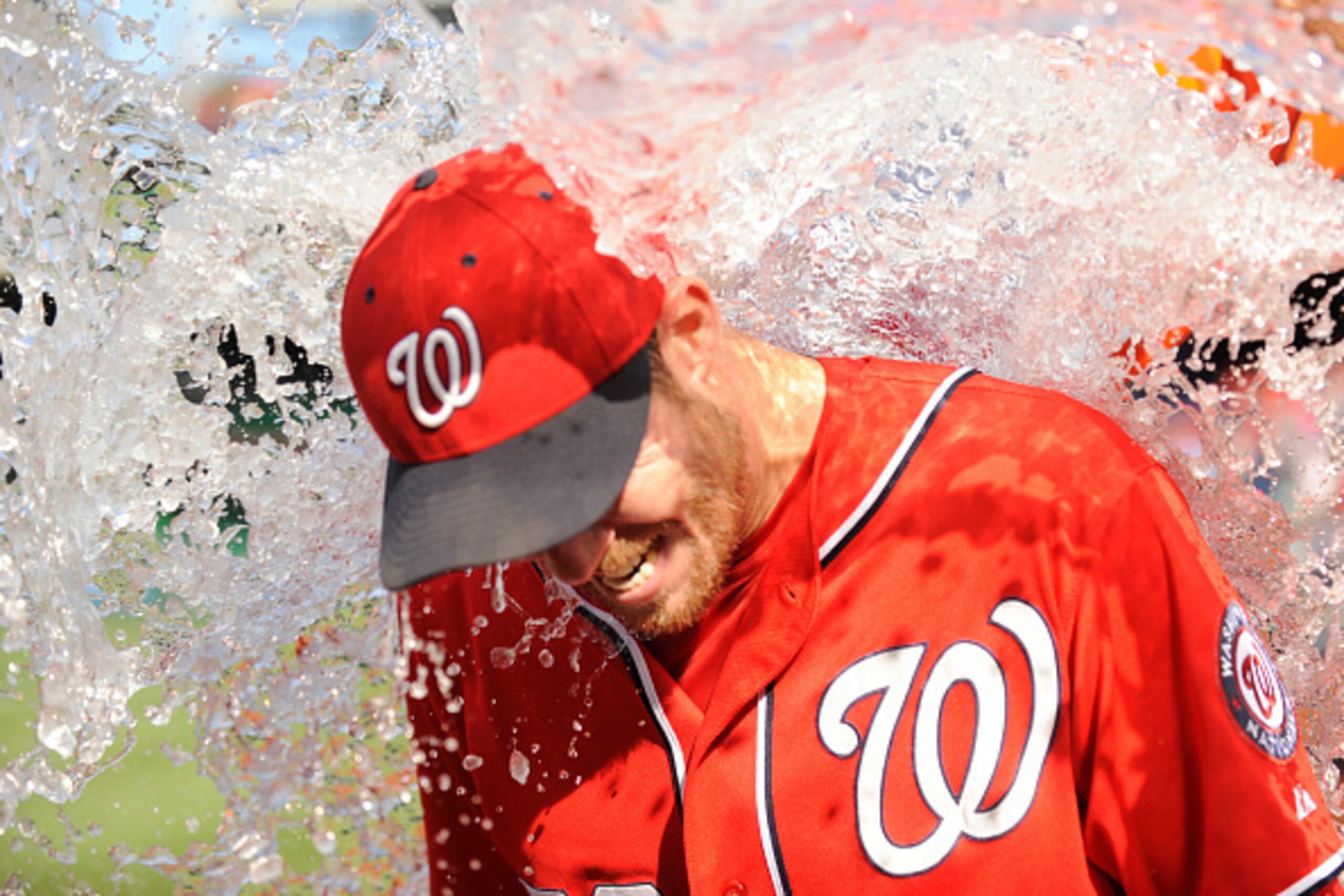 WASHINGTON, DC - SEPTEMBER 26:  Doug Fister #58 of the Washington Nationals gets water dumped on him after a complete game and shut out win of game one of a doubleheader against the Miami Marlins on September 26, 2014 at Nationals Park in Washington, DC. 