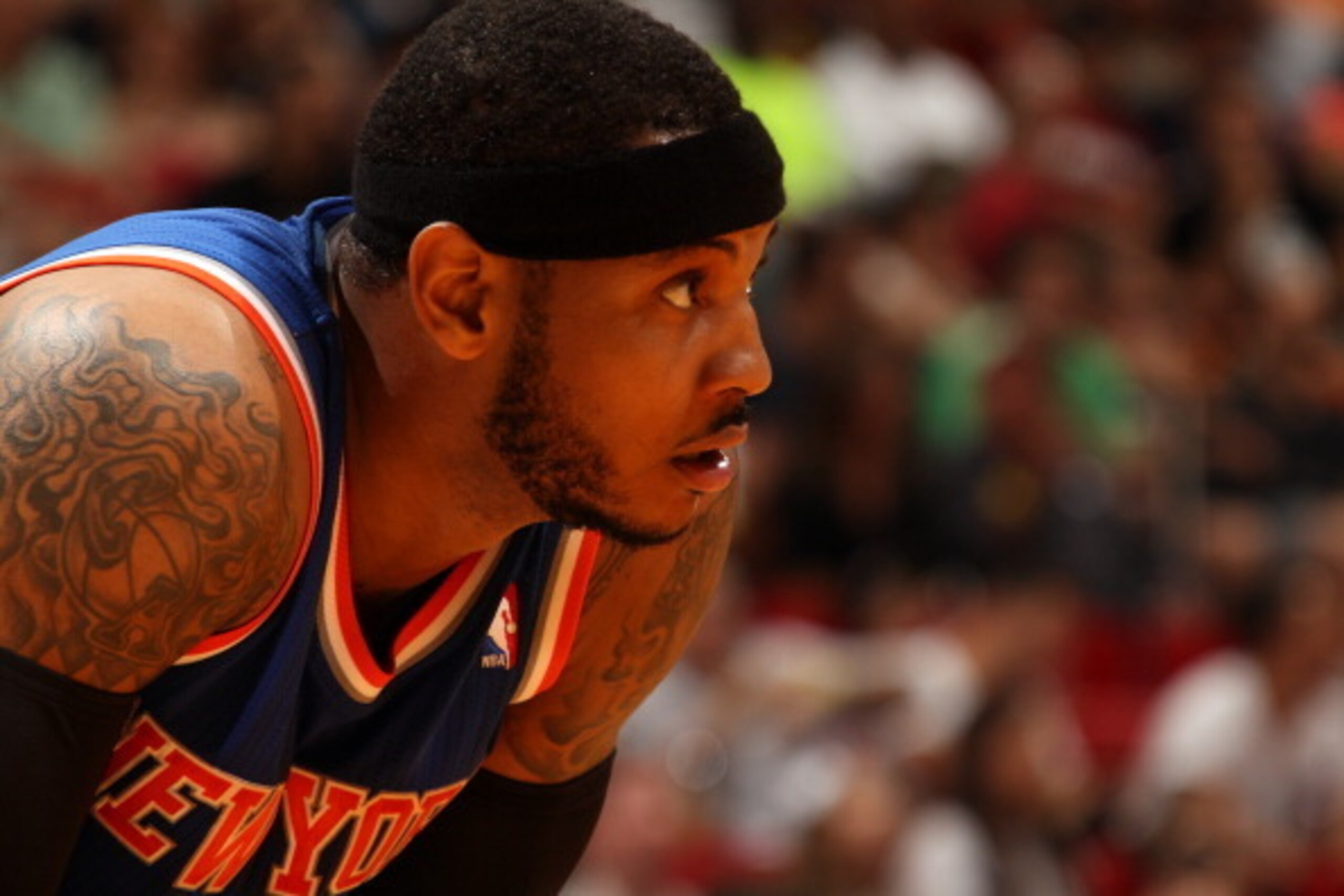 MIAMI, FL - April 6: Carmelo Anthony #7 of the New York Knicks looks on while on the court during the game against the Miami Heat at the American Airlines Arena in Miami, Florida on April 6, 2014. NOTE TO USER: User expressly acknowledges and agrees that,