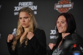 April 13, 2013; Las Vegas, NV, USA; Ronda Rousey (left) poses for photographs with Cat Zingano following the TUF 17 Finale at the Mandalay Bay Events Center. Mandatory Credit: Gary A. Vasquez-USA TODAY Sports