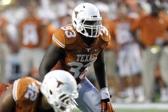 AUSTIN, TX - SEPTEMBER 6: Steve Edmond #33 of the Texas Longhorns awaits the snap against the BYU Cougars on September 6, 2014 at Darrell K Royal-Texas Memorial Stadium in Austin, Texas. (Photo by Chris Covatta/Getty Images)