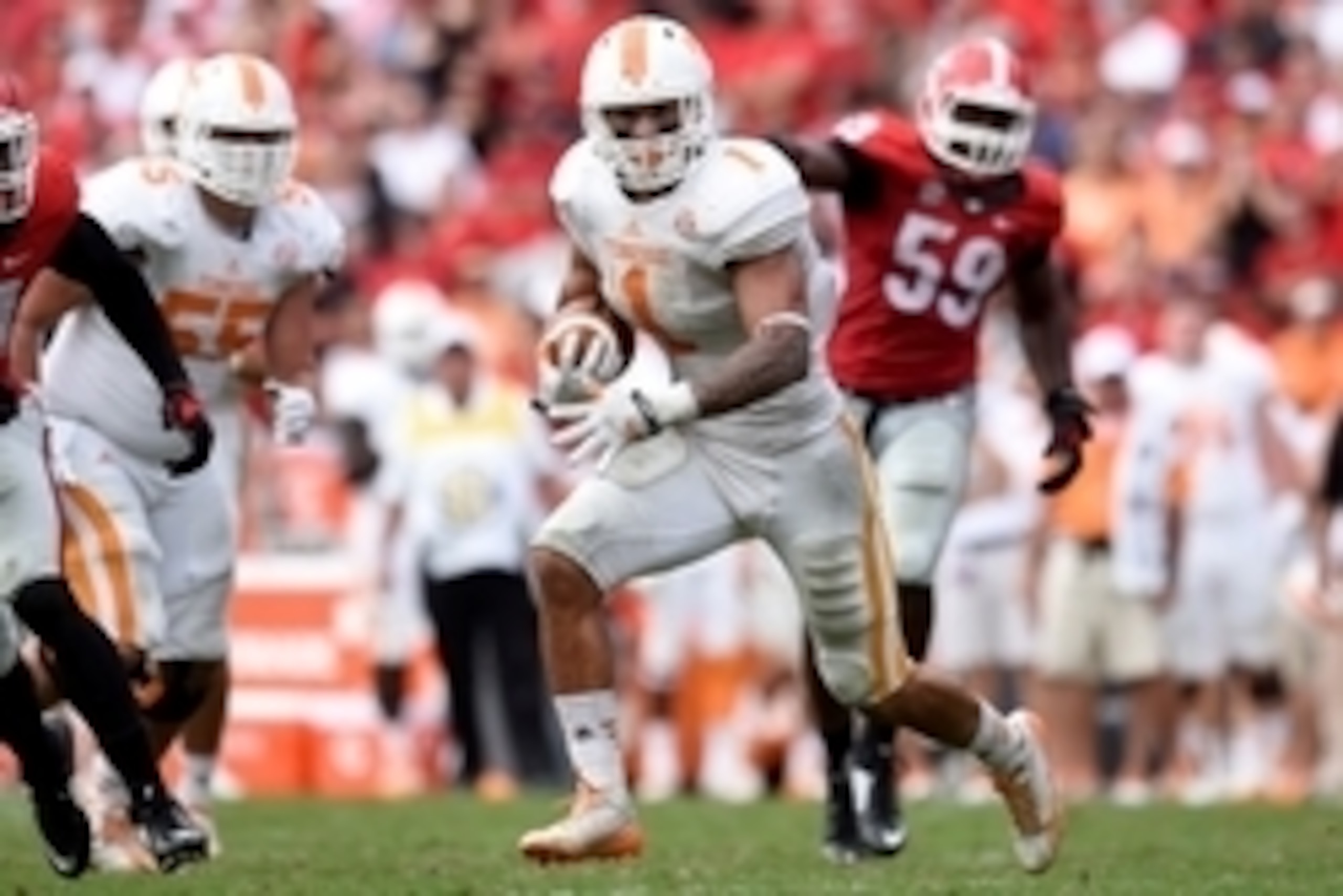 Sep 27, 2014; Athens, GA, USA; Tennessee Volunteers running back Jalen Hurd (1) runs against the Georgia Bulldogs during the second half at Sanford Stadium. Georgia defeated Tennessee 35-32. Mandatory Credit: Dale Zanine-USA TODAY Sports