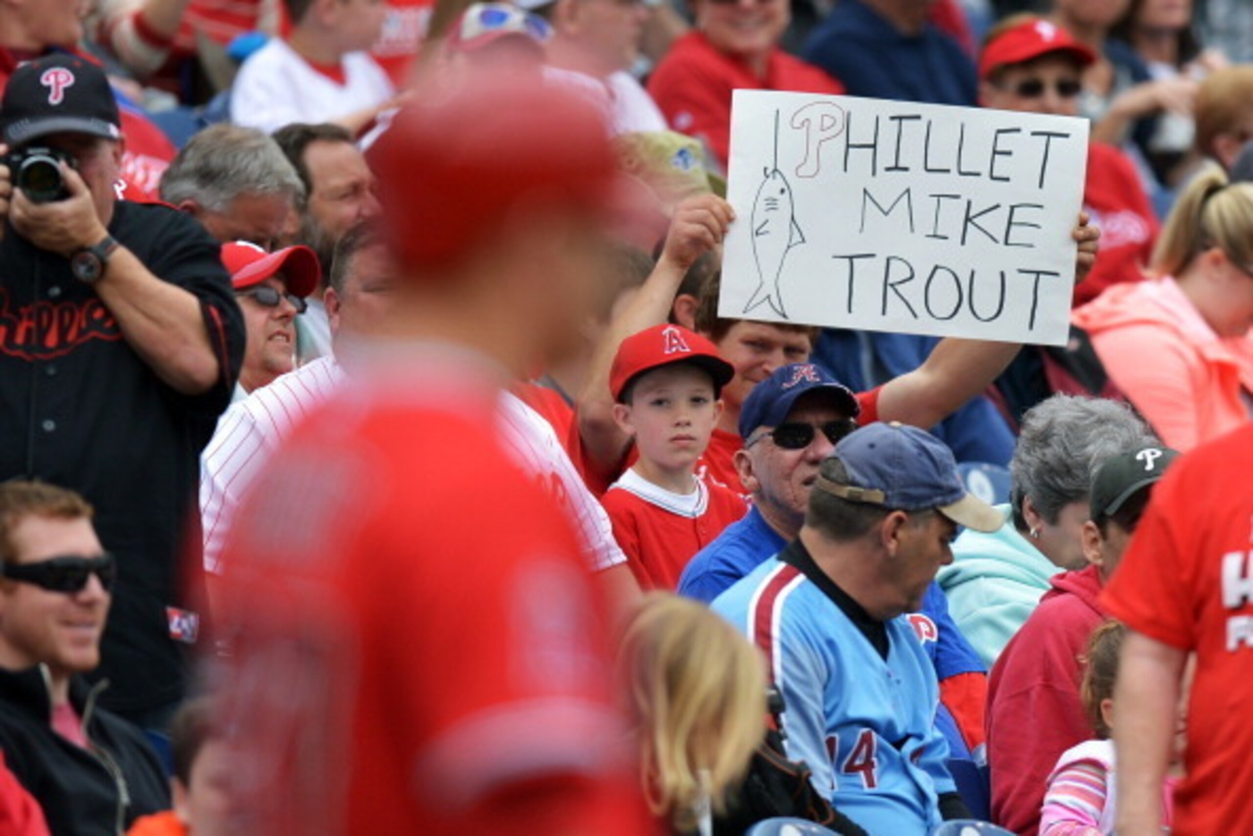 PHILADELPHIA, PA - MAY 14: A fan holds up a sign for Mike Trout #27 of the Los Angeles Angels of Anaheim as he waits on deck in the first inning against the Philadelphia Phillies at Citizens Bank Park on May 14, 2014 in Philadelphia, Pennsylvania. (Photo 