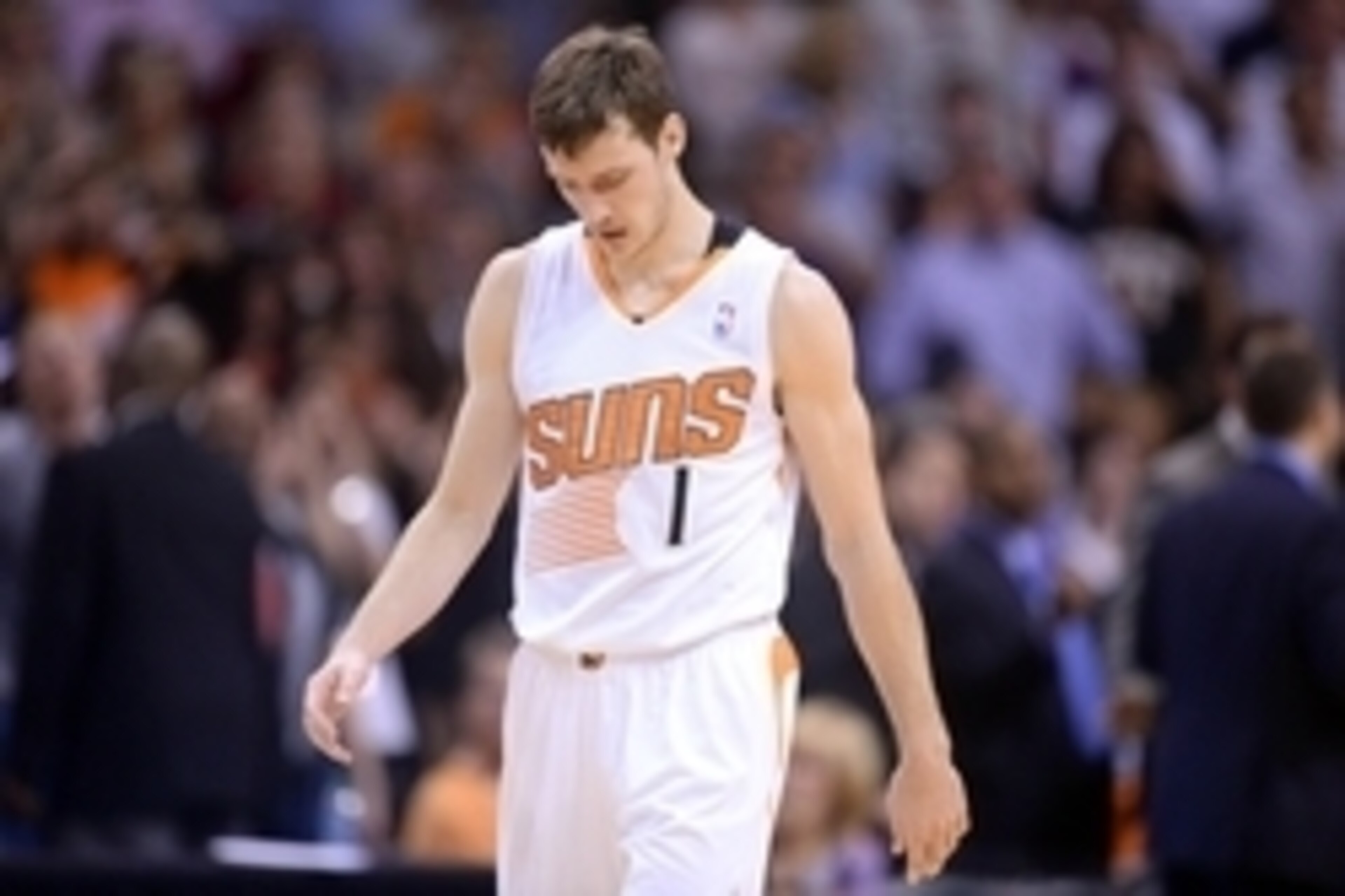 Apr 14, 2014; Phoenix, AZ, USA; Phoenix Suns guard Goran Dragic (1) looks down against the Memphis Grizzlies during the second half at US Airways Center. The Grizzlies won 97-91. Mandatory Credit: Joe Camporeale-USA TODAY Sports Apr 14, 2014; Phoenix, AZ, USA; Phoenix Suns guard Goran Dragic (1) looks down against the Memphis Grizzlies during the second half at US Airways Center. The Grizzlies won 97-91. Mandatory Credit: Joe Camporeale-USA TODAY Sports
