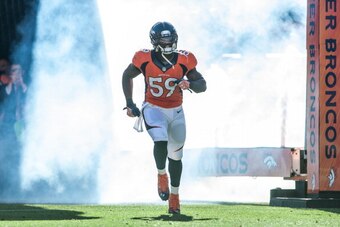 DENVER, CO - OCTOBER 27:  Outside linebacker Danny Trevathan #59 of the Denver Broncos runs onto the field during player introductions before a game against the Washington Redskins at Sports Authority Field Field at Mile High on October 27, 2013 in Denver