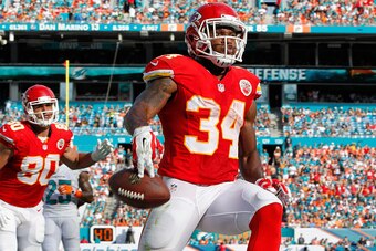 MIAMI GARDENS, FL - SEPTEMBER 21:  Running back Knile Davis #34 of the Kansas City Chiefs celebrates his second-quarter touchdown against the Miami Dolphins at Sun Life Stadium on September 21, 2014 in Miami Gardens, Florida.  (Photo by Joel Auerbach/Gett