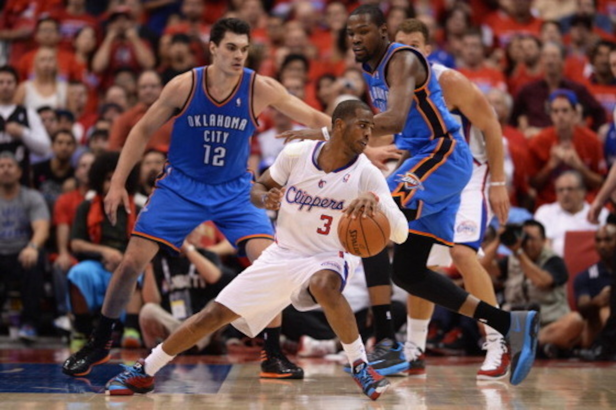 LOS ANGELES, CA - MAY 15: Chris Paul #3 of the Los Angeles Clippers handles the ball against the Oklahoma City Thunder in Game Six of the Western Conference Semifinals during the 2014 NBA Playoffs at Staples Center on May 15, 2014 in Los Angeles, Californ