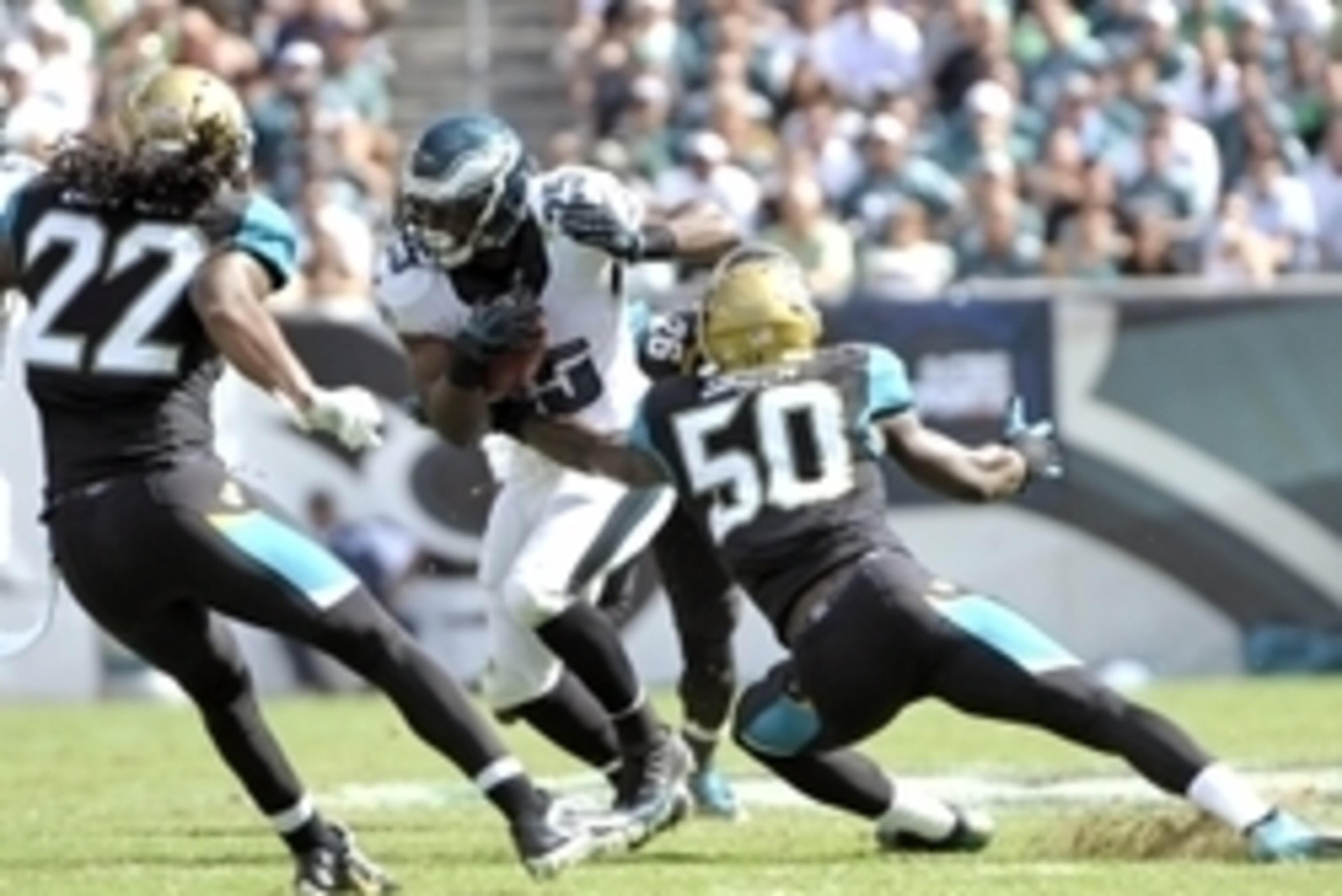 Sep 7, 2014; Philadelphia, PA, USA; Philadelphia Eagles running back LeSean McCoy (25) tries to move past Jacksonville Jaguars outside linebacker Telvin Smith (50) during the third quarter at Lincoln Financial Field. The Eagles defeated the Jaguars, 34-17 Sep 7, 2014; Philadelphia, PA, USA; Philadelphia Eagles running back LeSean McCoy (25) tries to move past Jacksonville Jaguars outside linebacker Telvin Smith (50) during the third quarter at Lincoln Financial Field. The Eagles defeated the Jaguars, 34-17