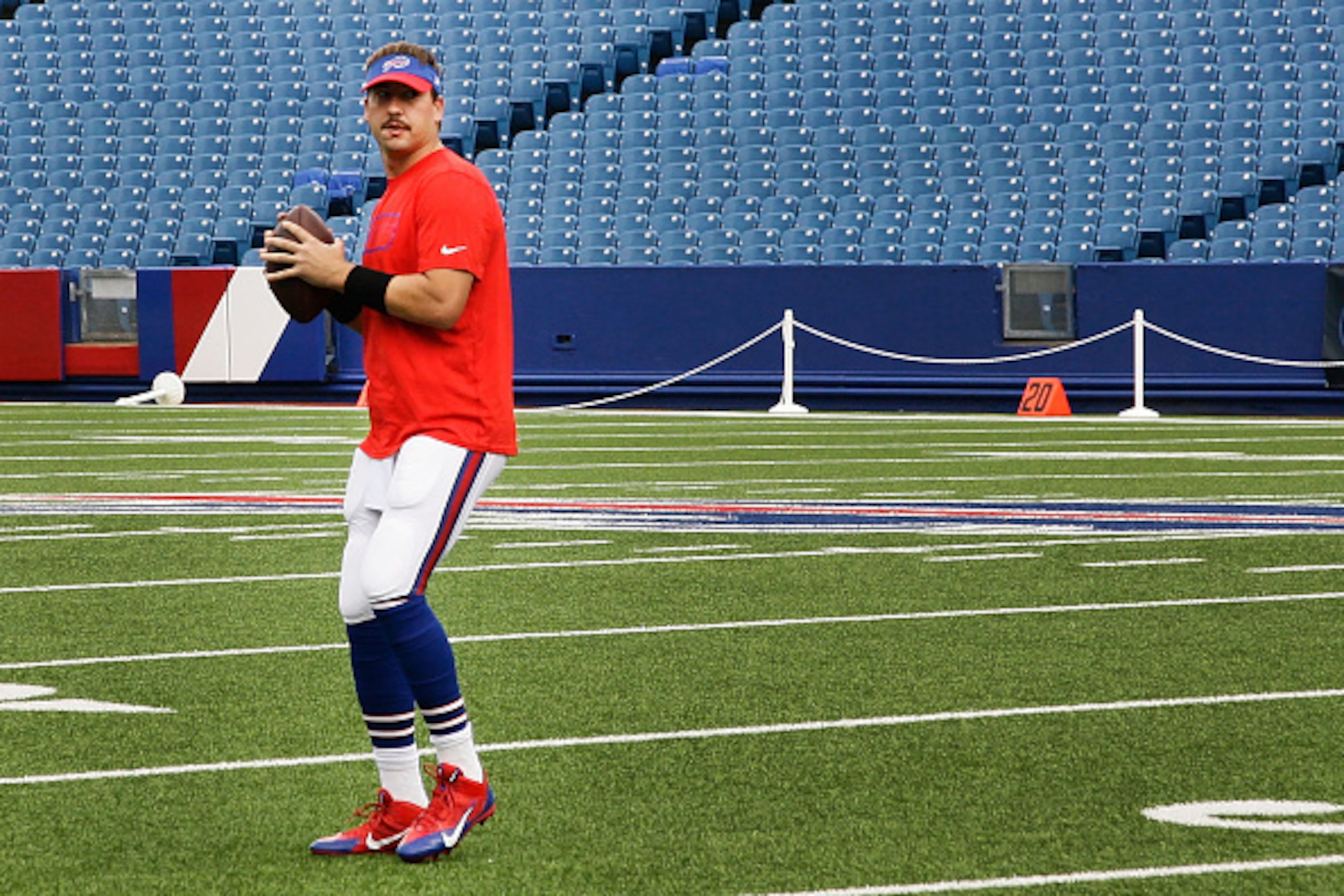 ORCHARD PARK, NY - SEPTEMBER 21:  Kyle Orton #18 of the Buffalo Bills warms up before the game against the San Diego Chargers at Ralph Wilson Stadium on September 21, 2014 in Orchard Park, New York.  (Photo by Michael Adamucci/Getty Images)