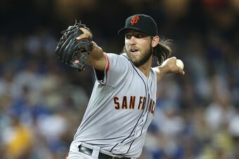 LOS ANGELES, CA - SEPTEMBER 23:  Madison Bumgarner #40 of the San Francisco Giants throws a pitch against the Los Angeles Dodgers at Dodger Stadium on September 23, 2014 in Los Angeles, California.  (Photo by Stephen Dunn/Getty Images)