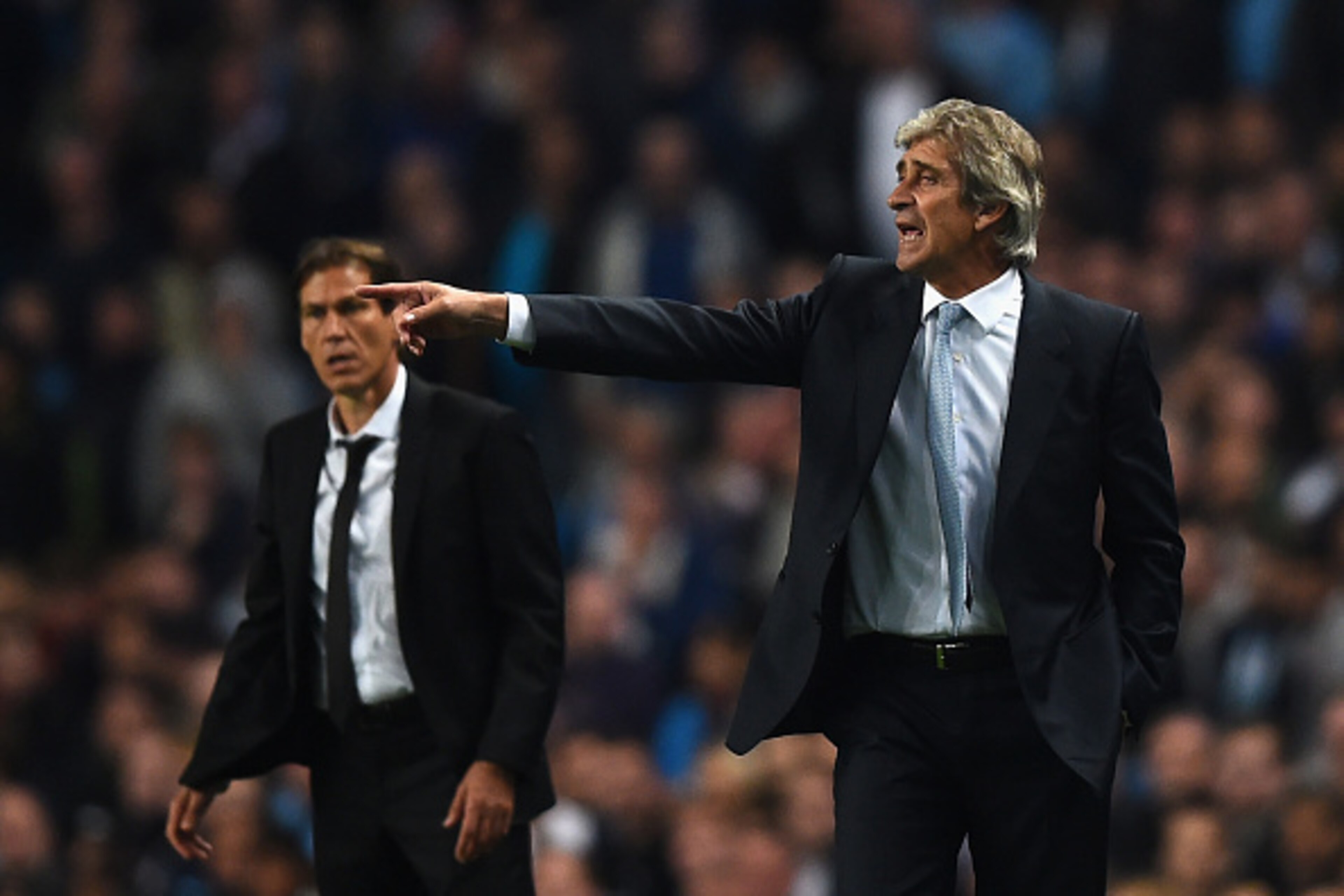MANCHESTER, ENGLAND - SEPTEMBER 30:  Manchester City Manager Manuel Pellegrini  gestures during the UEFA Champions League Group E match between Manchester City FC and AS Roma  on September 30, 2014 in Manchester, United Kingdom.  (Photo by Laurence Griffi