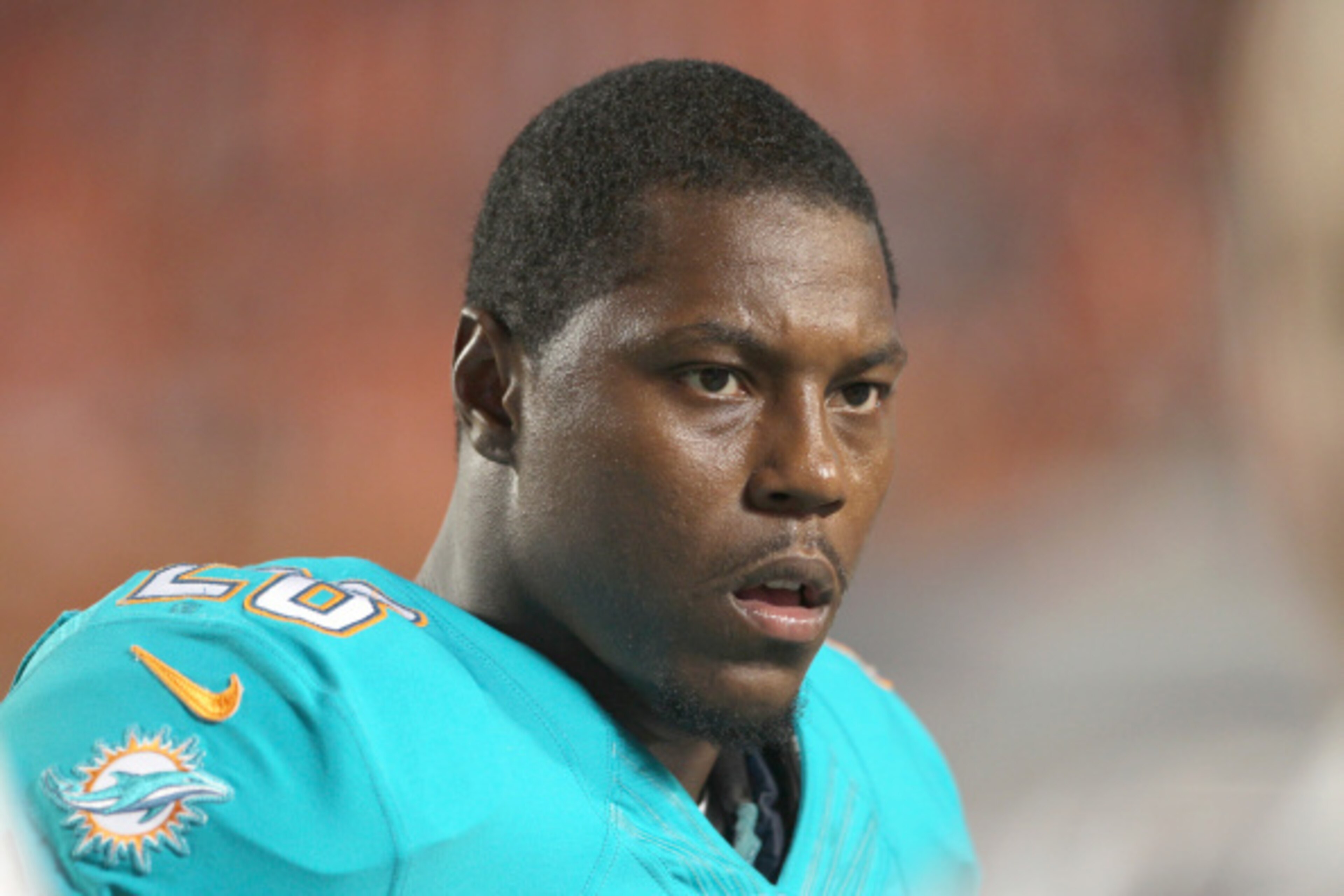MIAMI GARDENS, FL - AUGUST 28:  Knowshon Moreno #28 of the Miami Dolphins looks on in the fourth quarter during action against the St. Louis Rams at Sun Life Stadium on August 28, 2014 in Miami Gardens, Florida.  (Photo by Marc Serota/Getty Images)