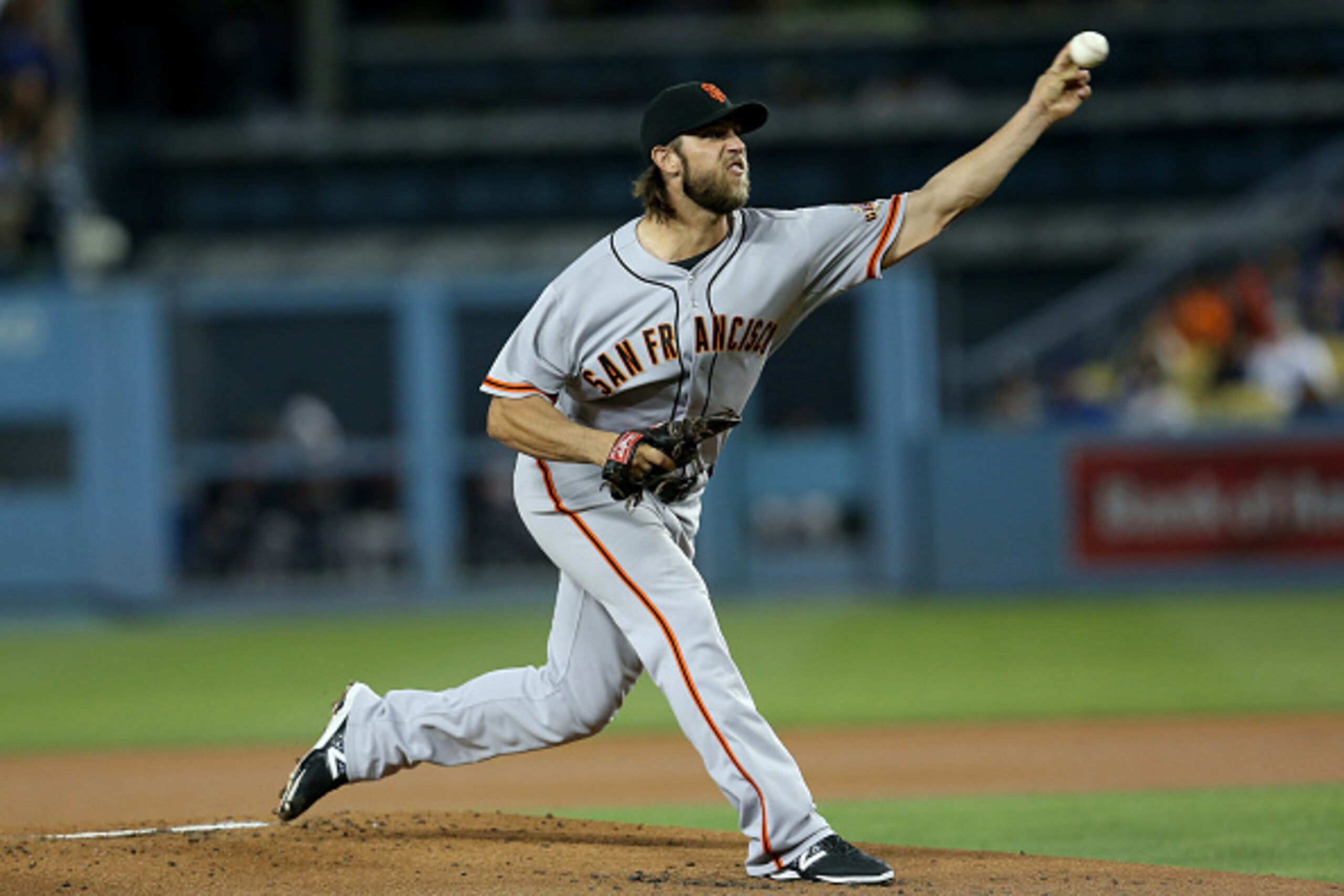 LOS ANGELES, CA - SEPTEMBER 23:  Madison Bumgarner #40 of the San Francisco Giants throws a pitch against the Los Angeles Dodgers at Dodger Stadium on September 23, 2014 in Los Angeles, California.  (Photo by Stephen Dunn/Getty Images)