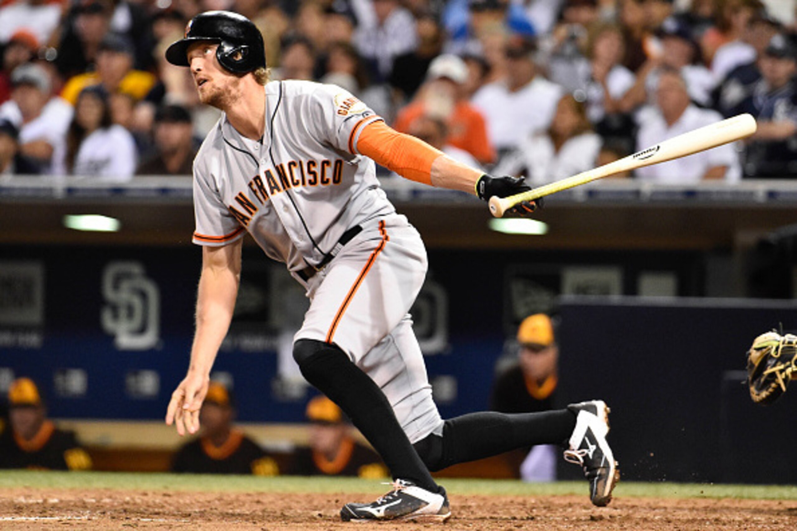 SAN DIEGO, CA - SEPTEMBER 20:  Hunter Pence #8 of the San Francisco Giants hits a solo home run during the ninth inning of a baseball game against the San Diego Padres at Petco Park September, 20, 2014 in San Diego, California.  (Photo by Denis Poroy/Gett