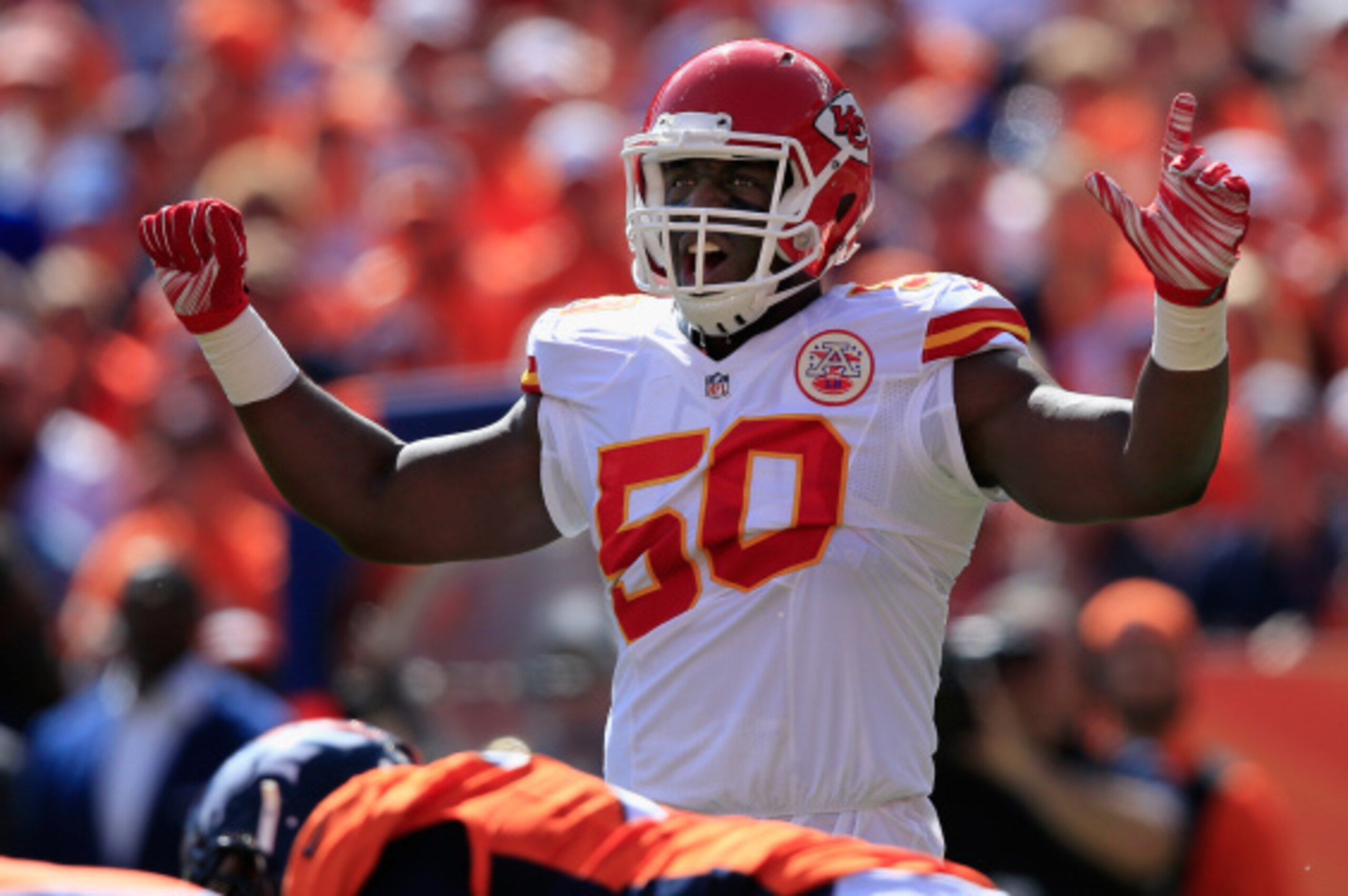 DENVER, CO - SEPTEMBER 14:  Outside linebacker Justin Houston #50 of the Kansas City Chiefs faces the Denver Broncos at Sports Authority Field at Mile High on September 14, 2014 in Denver, Colorado. The Broncos defeated the Chiefs 24-17.  (Photo by Doug P