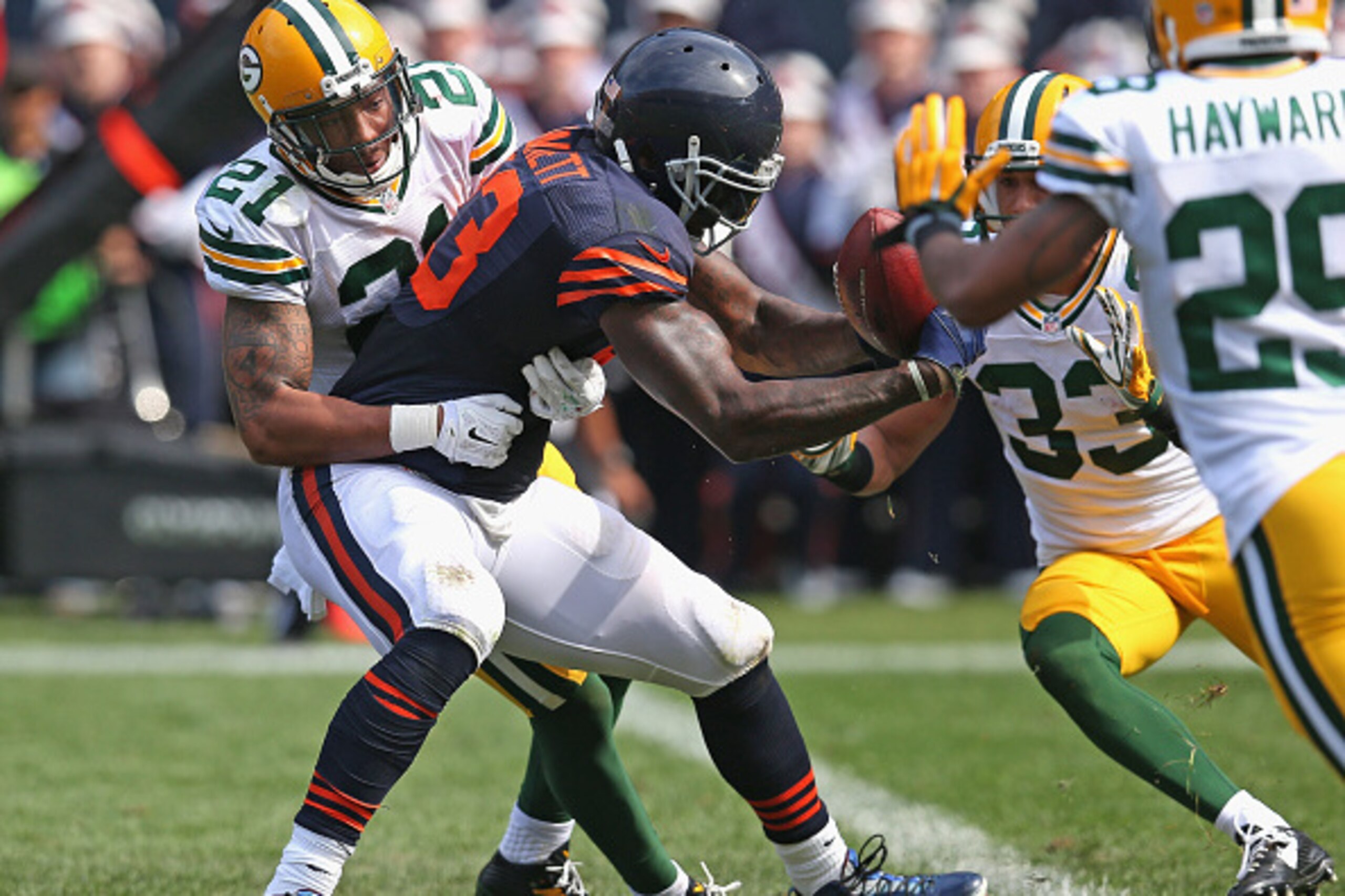 CHICAGO, IL - SEPTEMBER 28:  Martellus Bennett #83 of the Chicago Bears is stopped short of the end zone by Ha Ha Clinton-Dix #21 of the Green Bay Packers at Soldier Field on September 28, 2014 in Chicago, Illinois. The Packers defeated the Bears 38-17.