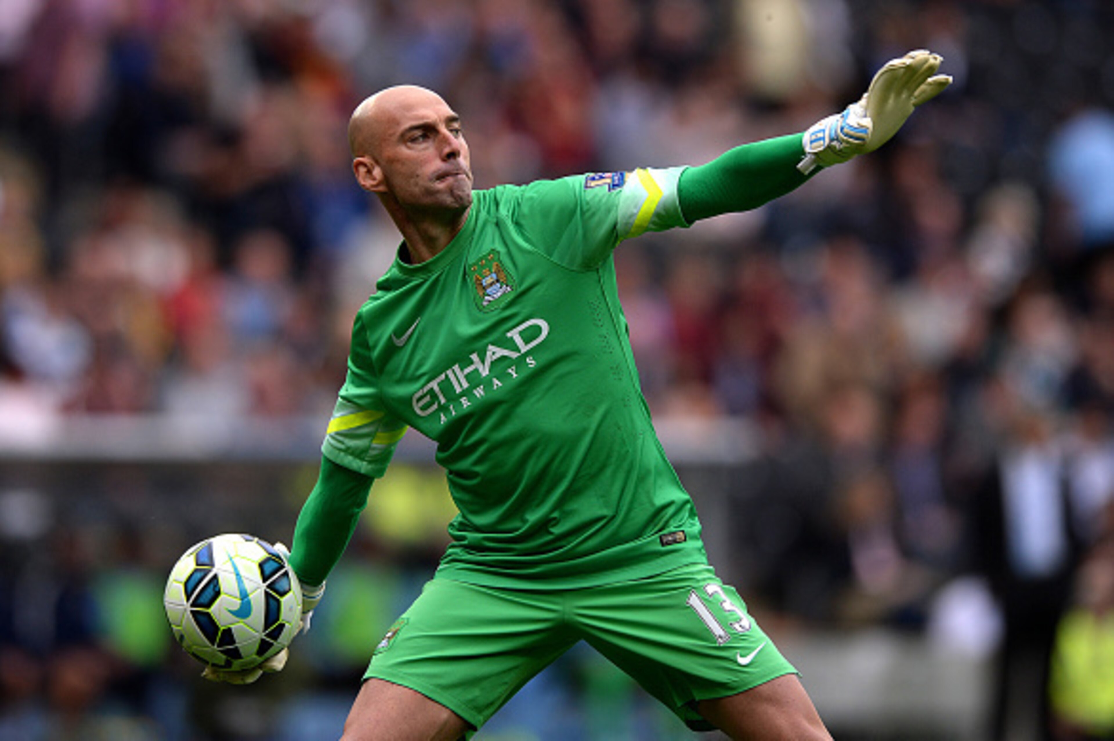 HULL, ENGLAND - SEPTEMBER 27: Wilfredo Caballero of Manchester City throws the ball during the Barclays Premier League match between Hull City and Manchester City at KC Stadium on September 27, 2014 in Hull, England. (Photo by Gareth Copley/Getty Images HULL, ENGLAND - SEPTEMBER 27: Wilfredo Caballero of Manchester City throws the ball during the Barclays Premier League match between Hull City and Manchester City at KC Stadium on September 27, 2014 in Hull, England. (Photo by Gareth Copley/Getty Images
