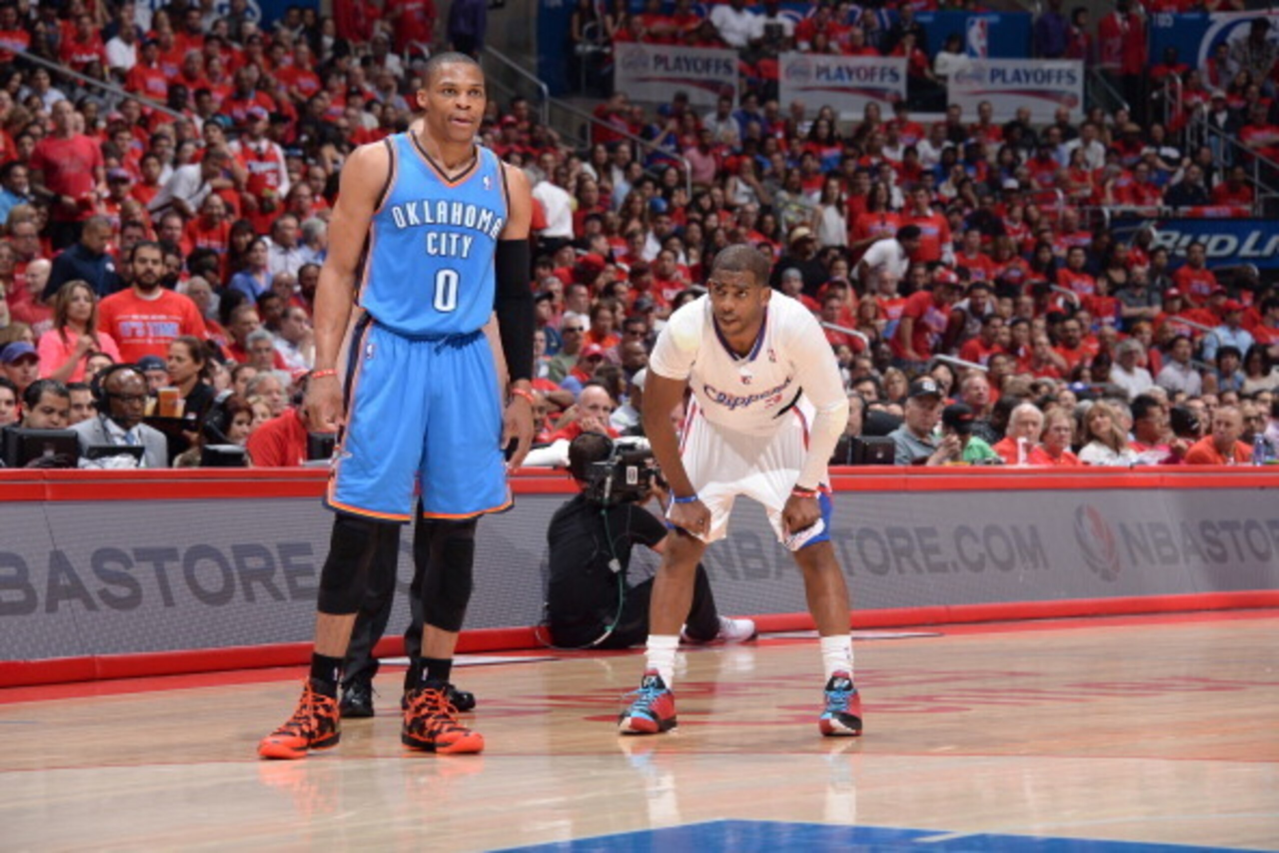 LOS ANGELES, CA - MAY 15: Russell Westbrook #0 of the Oklahoma City Thunder looks on against Chris Paul #3 of the Los Angeles Clippers in Game Six of the Western Conference Semifinals during the 2014 NBA Playoffs at Staples Center on May 15, 2014 in Los A