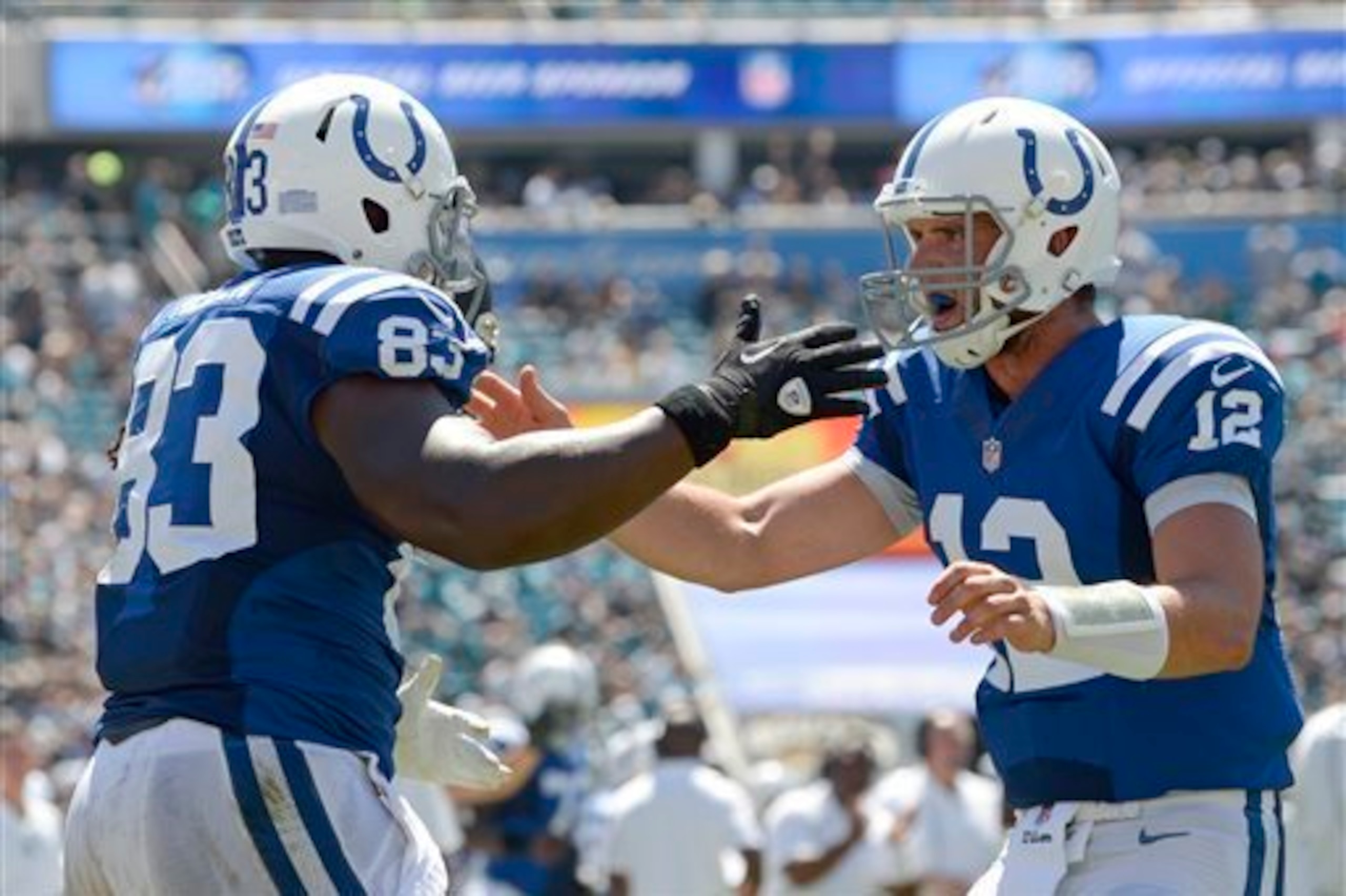 Andrew Luck might just be a bit excited to have Dwayne Allen back in the fold.