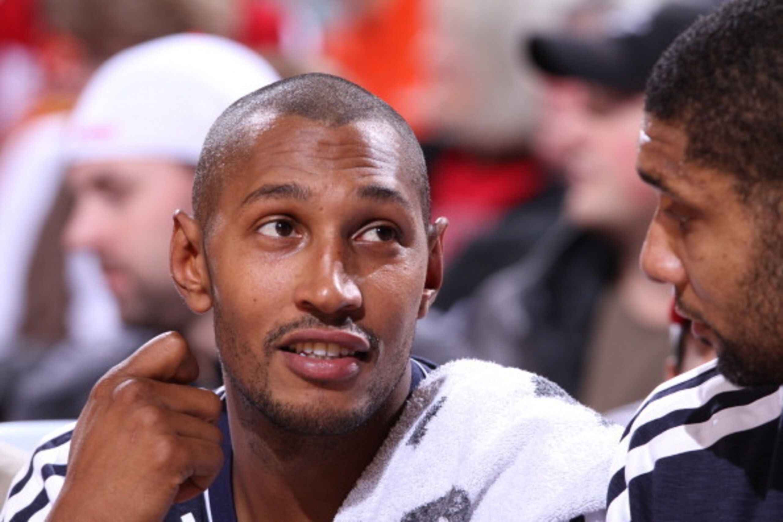 PORTLAND, OR - NOVEMBER10:  Boris Diaw #33 of the San Antonio Spurs talks with Tim Duncan #21 during the game against the Portland Trail Blazers on November 10, 2012 at the Rose Garden Arena in Portland, Oregon. NOTE TO USER: User expressly acknowledges a