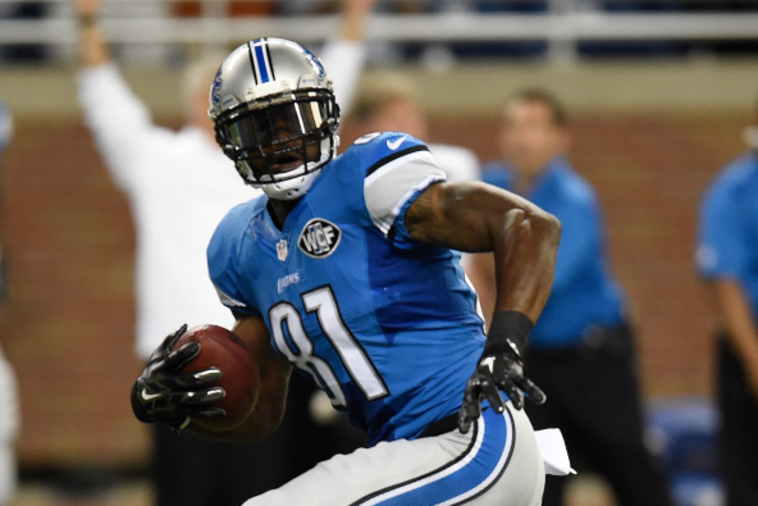 DETROIT, MI - SEPTEMBER 08: Calvin Johnson #81 of the Detroit Lions runs a first quarter touchdown against the New York Giants during a game at Ford Field on September 8, 2014 in Detroit, Michigan.  (Photo by Joe Sargent/Getty Images)