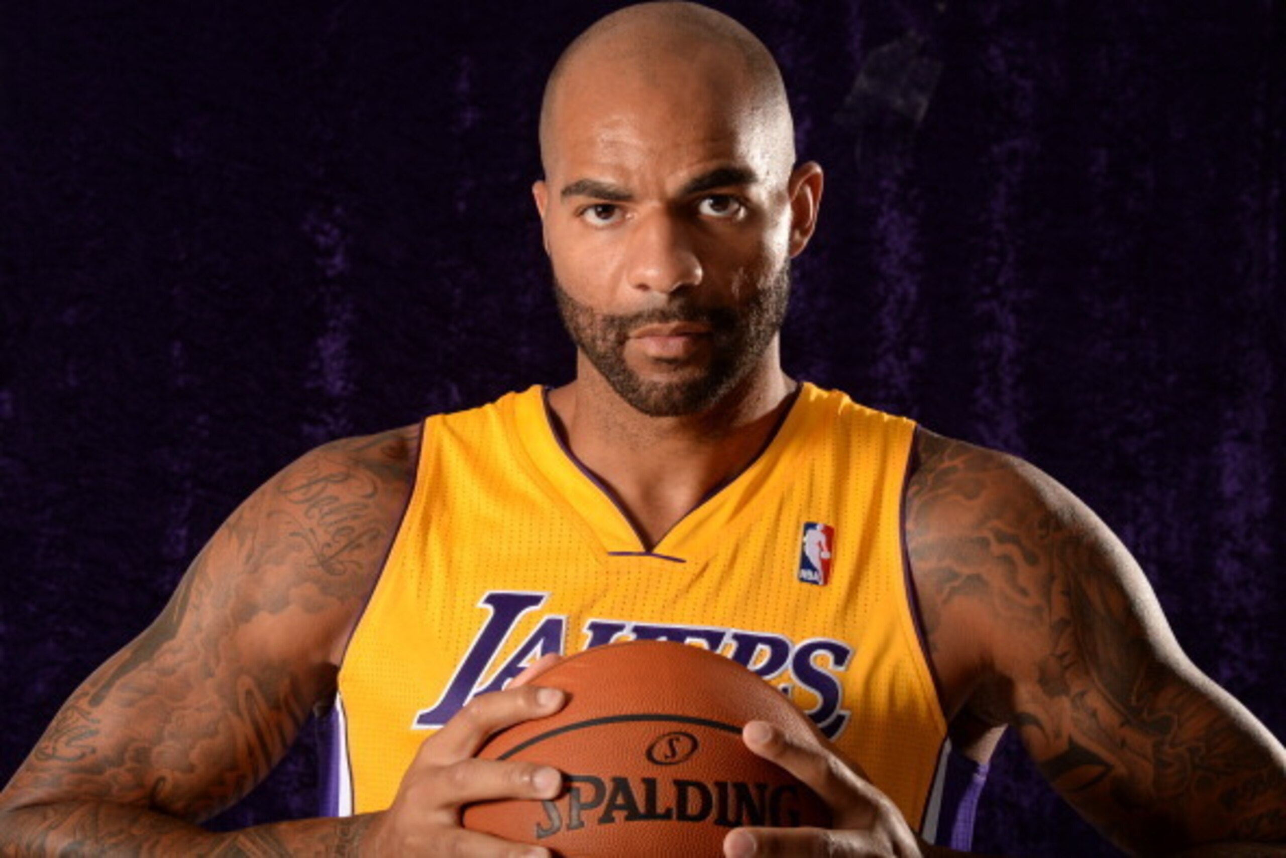 EL SEGUNDO, CA - JULY 25: Carlos Boozer #5 of the Los Angeles Lakers poses for a portrait after a press conference at the Toyota Sports Center on July 25, 2014 in El Segundo, California. NOTE TO USER: User expressly acknowledges and agrees that, by downlo EL SEGUNDO, CA - JULY 25: Carlos Boozer #5 of the Los Angeles Lakers poses for a portrait after a press conference at the Toyota Sports Center on July 25, 2014 in El Segundo, California. NOTE TO USER: User expressly acknowledges and agrees that, by downlo
