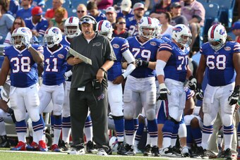 ORCHARD PARK, NY - AUGUST 23: Head coach Doug Marrone of the Buffalo Bills works from the sidelines against the Tampa Bay Buccaneers during the first half at Ralph Wilson Stadium on August 23, 2014 in Orchard Park, New York. (Photo by Vaughn Ridley/Getty 