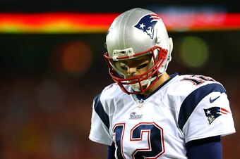 KANSAS CITY, MO - SEPTEMBER 29:  Tom Brady #12 of the New England Patriots on the sidelines during the game against the Kansas City Chiefs at Arrowhead Stadium on September 29, 2014 in Kansas City, Missouri.  (Photo by Dilip Vishwanat/Getty Images)