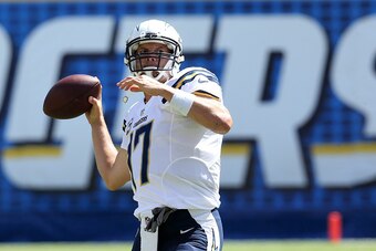 SAN DIEGO, CA - SEPTEMBER 28:  Philip Rivers #17 of the San Diego Chargers throws the ball during warmups for the game with the Jacksonville Jaguars at Qualcomm Stadium on September 28, 2014 in San Diego, California.  (Photo by Stephen Dunn/Getty Images)