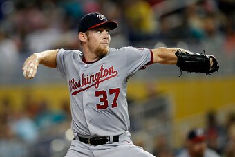 MIAMI, FL - SEPTEMBER 21: Stephen Strasburg #37 of the Washington Nationals delivers a pitch against the Miami Marlins in the first inning at Marlins Park on September 21, 2014 in Miami, Florida. (Photo by Eliot J. Schechter/Getty Images)