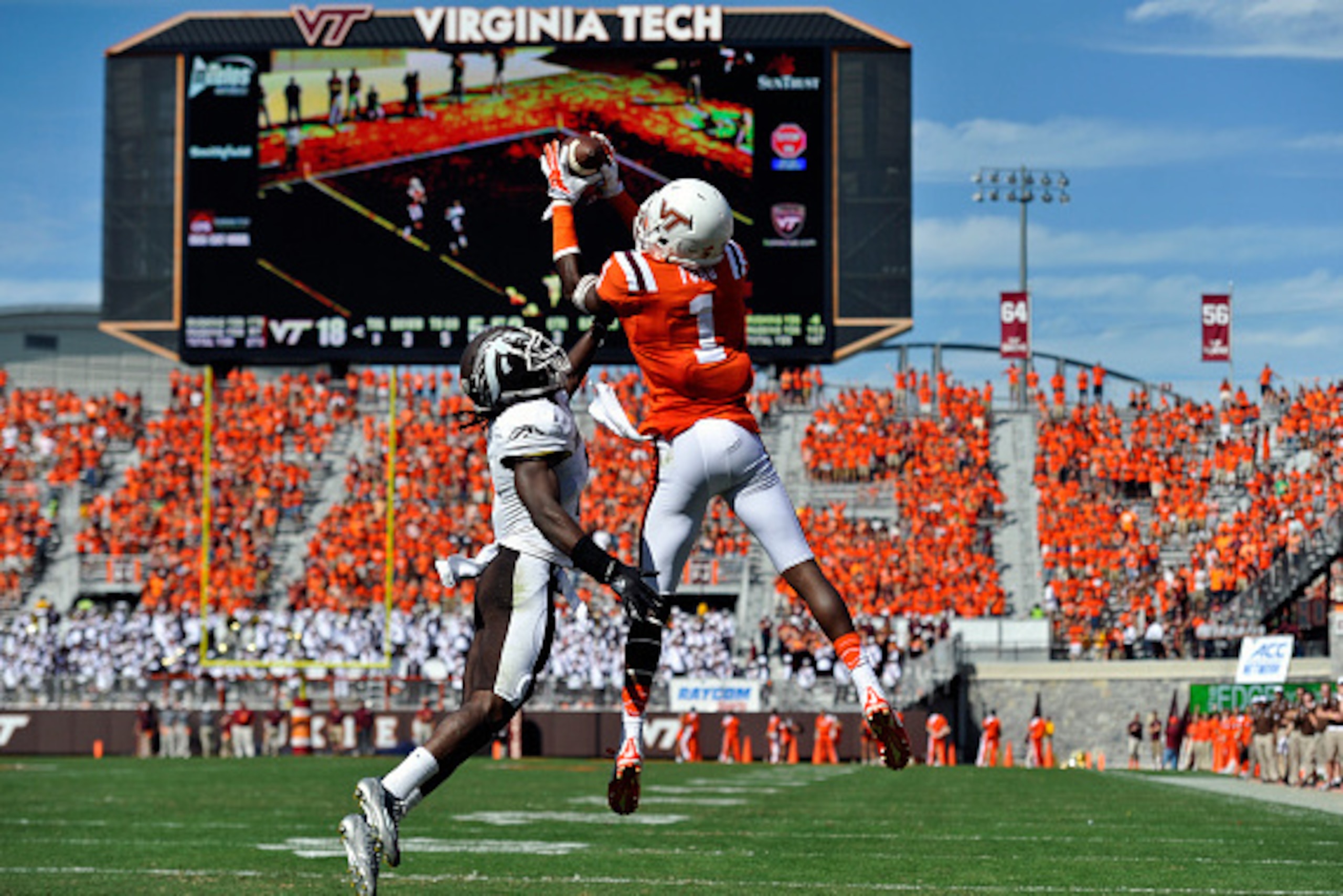 BLACKSBURG, VA - SEPTEMBER 27:  Wide receiver Isaiah Ford #1 of the Virginia Tech Hokies makes a touchdown catch while being defended by cornerback Ronald Zamort #7 of the Western Michigan Broncos in the second half at Lane Stadium on September 27, 2014 i