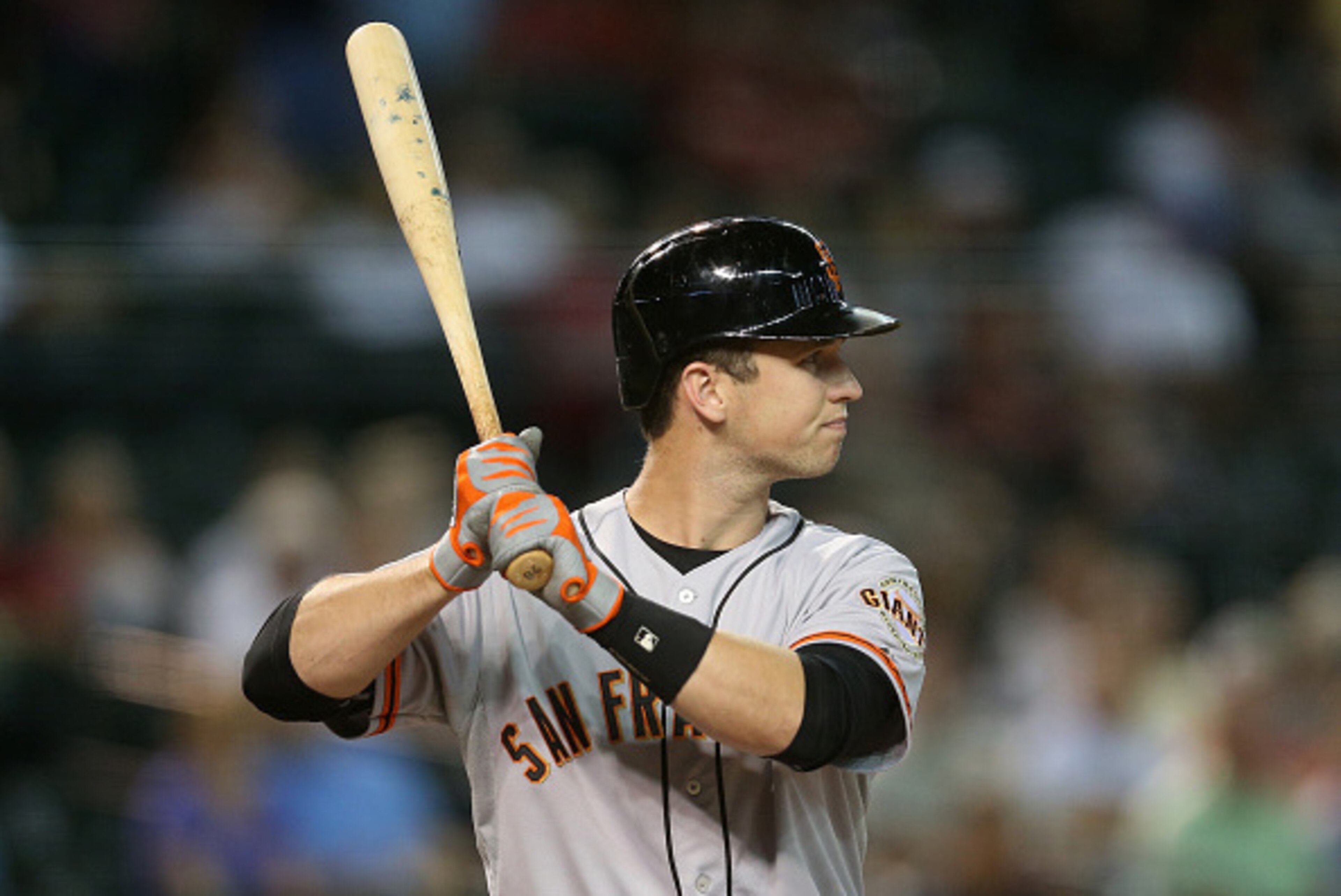 PHOENIX, AZ - SEPTEMBER 17:  Buster Posey #28 of the San Francisco Giants at bat during the MLB game against the Arizona Diamondbacks at Chase Field on September 17, 2014 in Phoenix, Arizona. The Giants defeated the Diamondbacks 4-2.  (Photo by Christian 