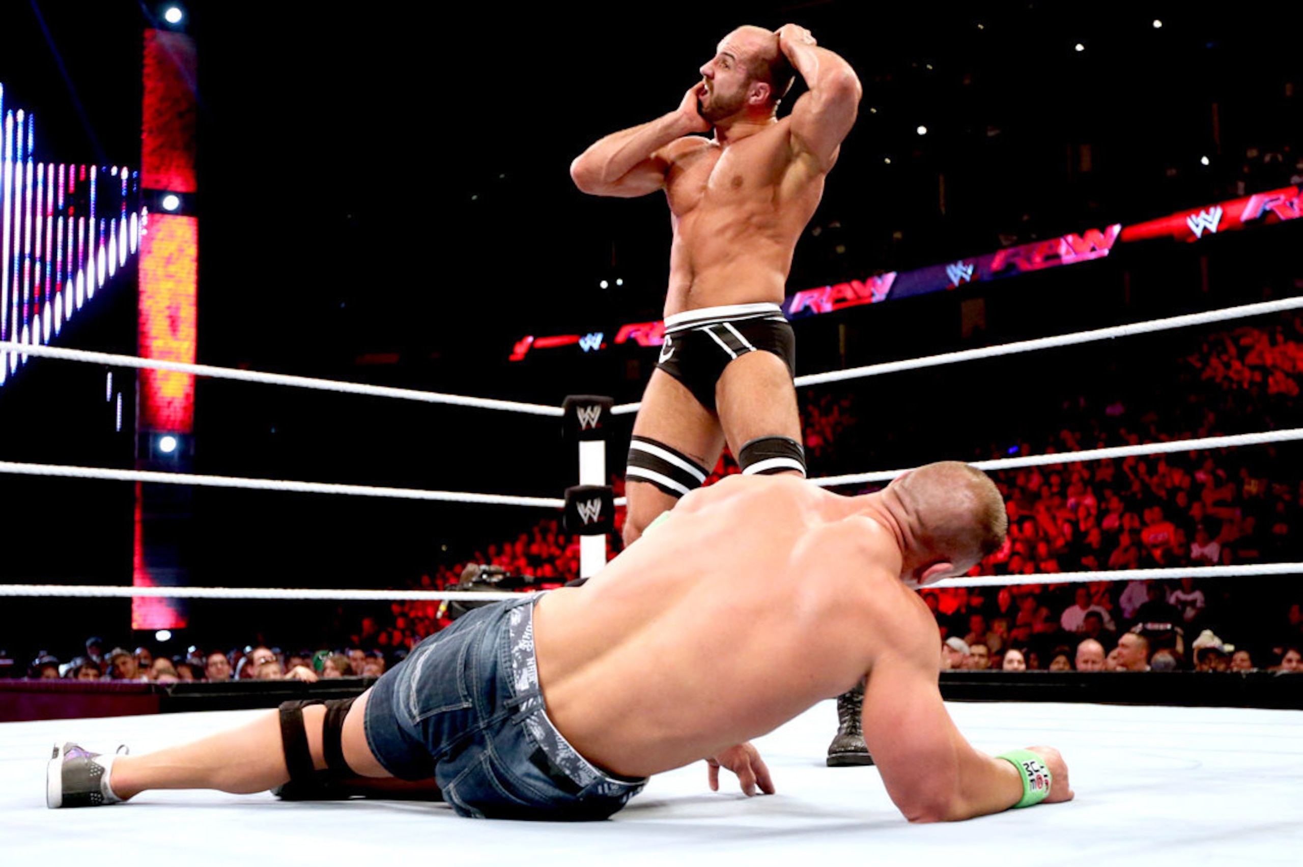 Cesaro battles John Cena.