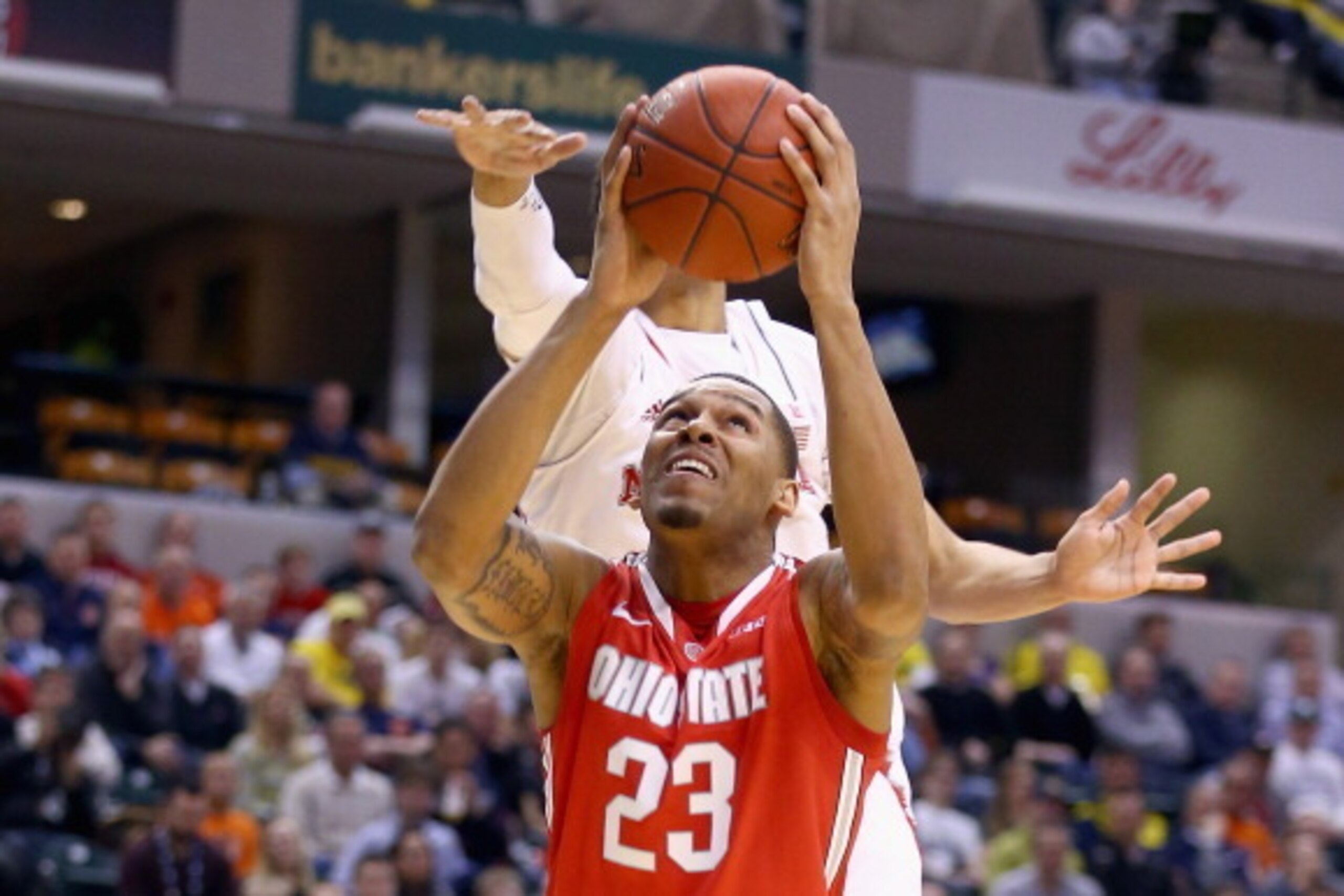 INDIANAPOLIS, IN - MARCH 14:  Amir Williams #23 of the Ohio State Buckeyes shoots the ball in the game against the  Nebraska Cornhuskers during the Quarterfinals of the Big Ten Basketball Tournament at Bankers Life Fieldhouse on March 14, 2014 in Indianap