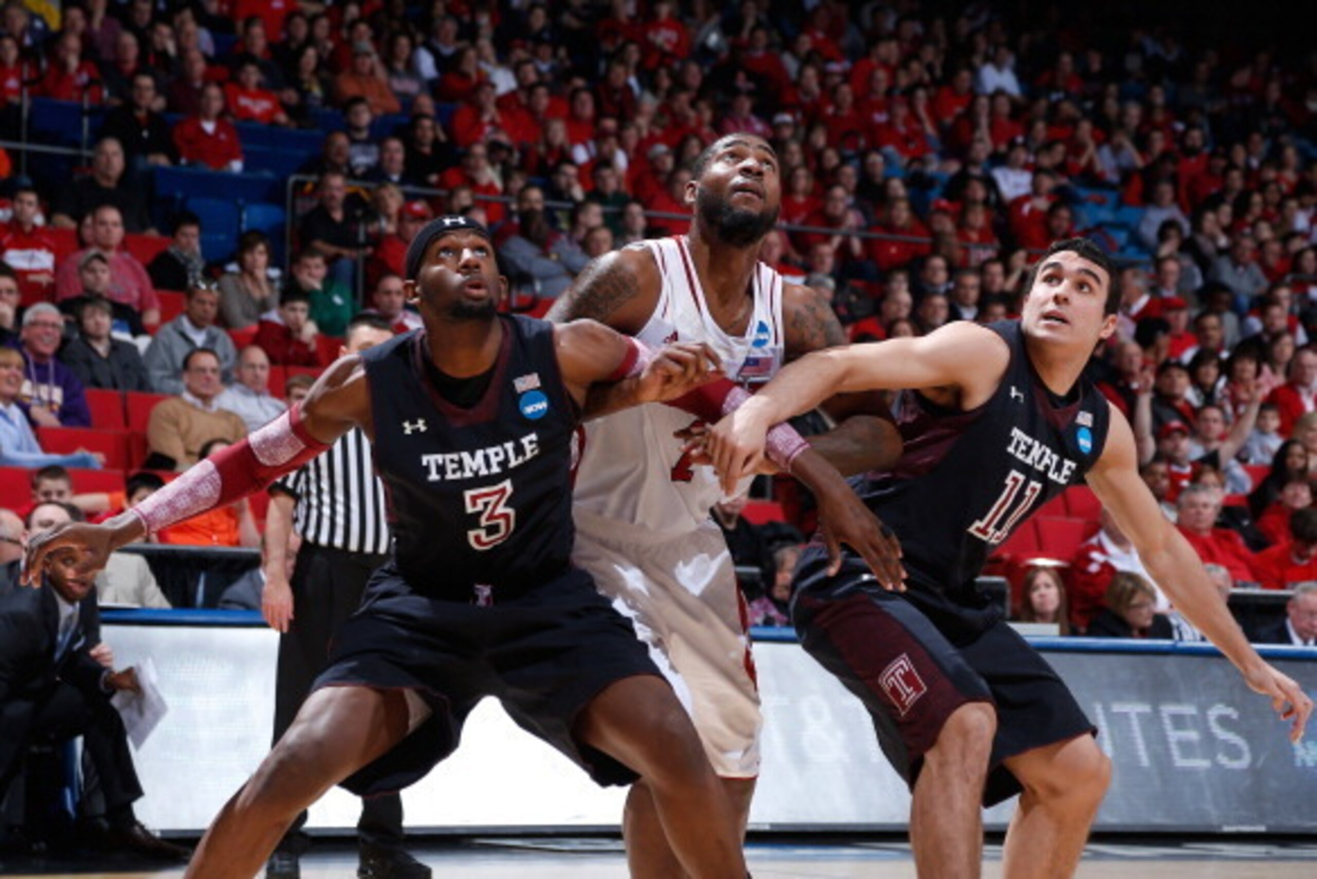 DAYTON, OH - MARCH 22: Richard Howell #1 of the North Carolina State Wolfpack battles with Anthony Lee #3 and T.J. DiLeo #11 of the Temple Owls during a free throw in the first half during the second round of the 2013 NCAA Men's Basketball Tournament at U