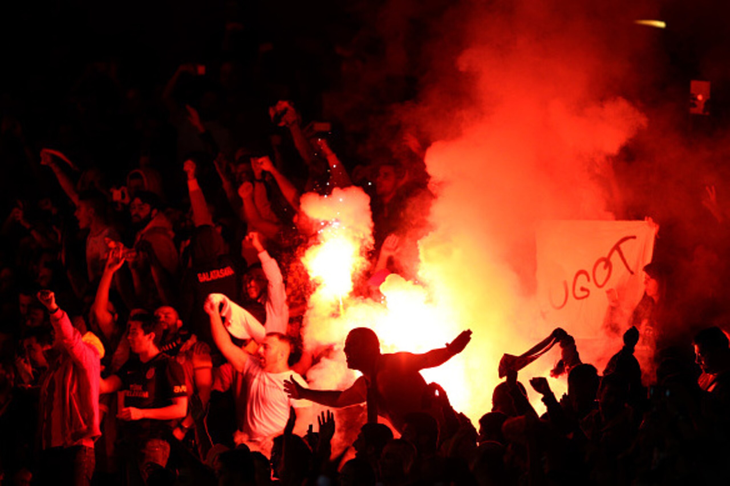 LONDON, ENGLAND - OCTOBER 01:  Galatasaray AS light flare after conceding a second goal during the UEFA Champions League group D match between Arsenal FC and Galatasaray AS at Emirates Stadium on October 1, 2014 in London, United Kingdom.  (Photo by Paul 