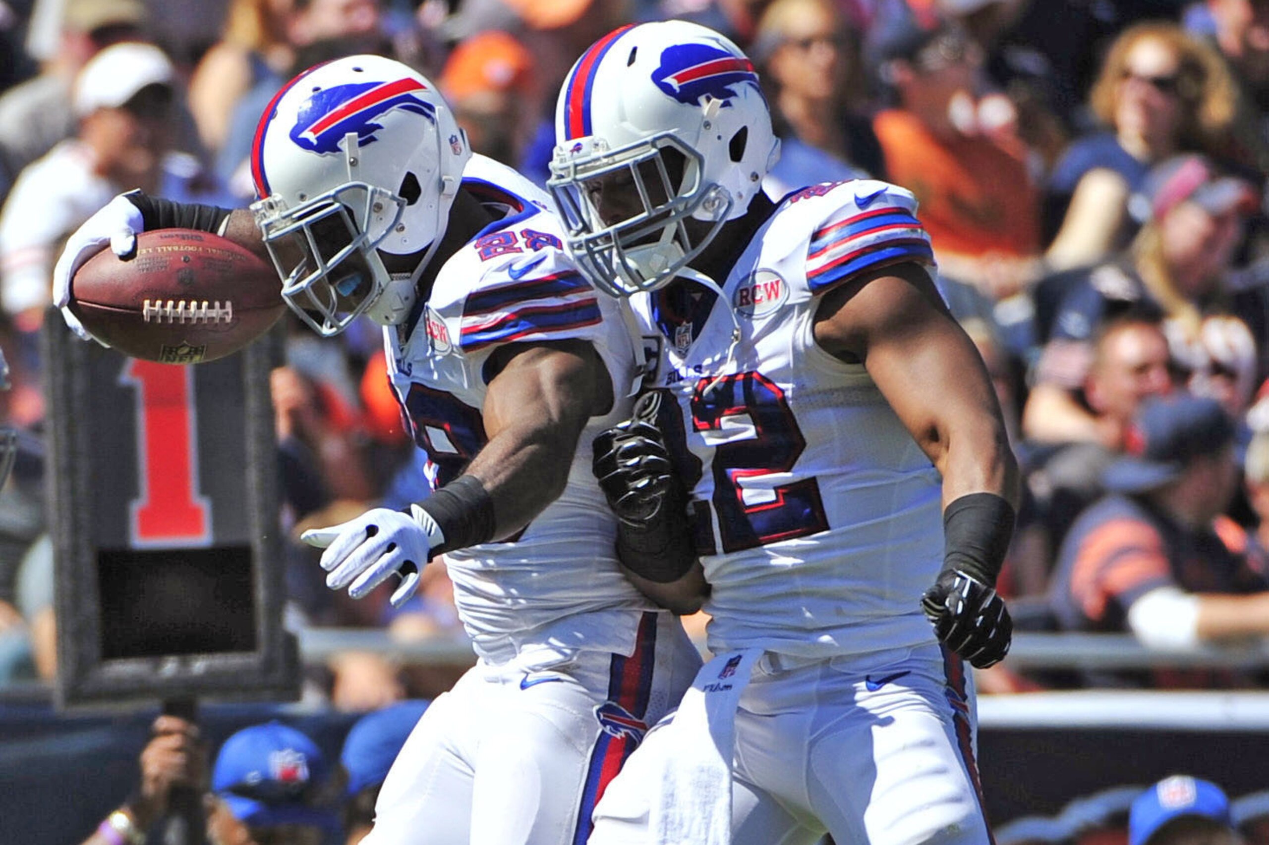 CHICAGO, IL - SEPTEMBER 07: C.J. Spiller #28 of the Buffalo Bills celebrates his first quarter touchdown with Fred Jackson #22 of the Buffalo Bills on September 7, 2014 at Soldier Field in Chicago, Illinois.  (Photo by David Banks/Getty Images)