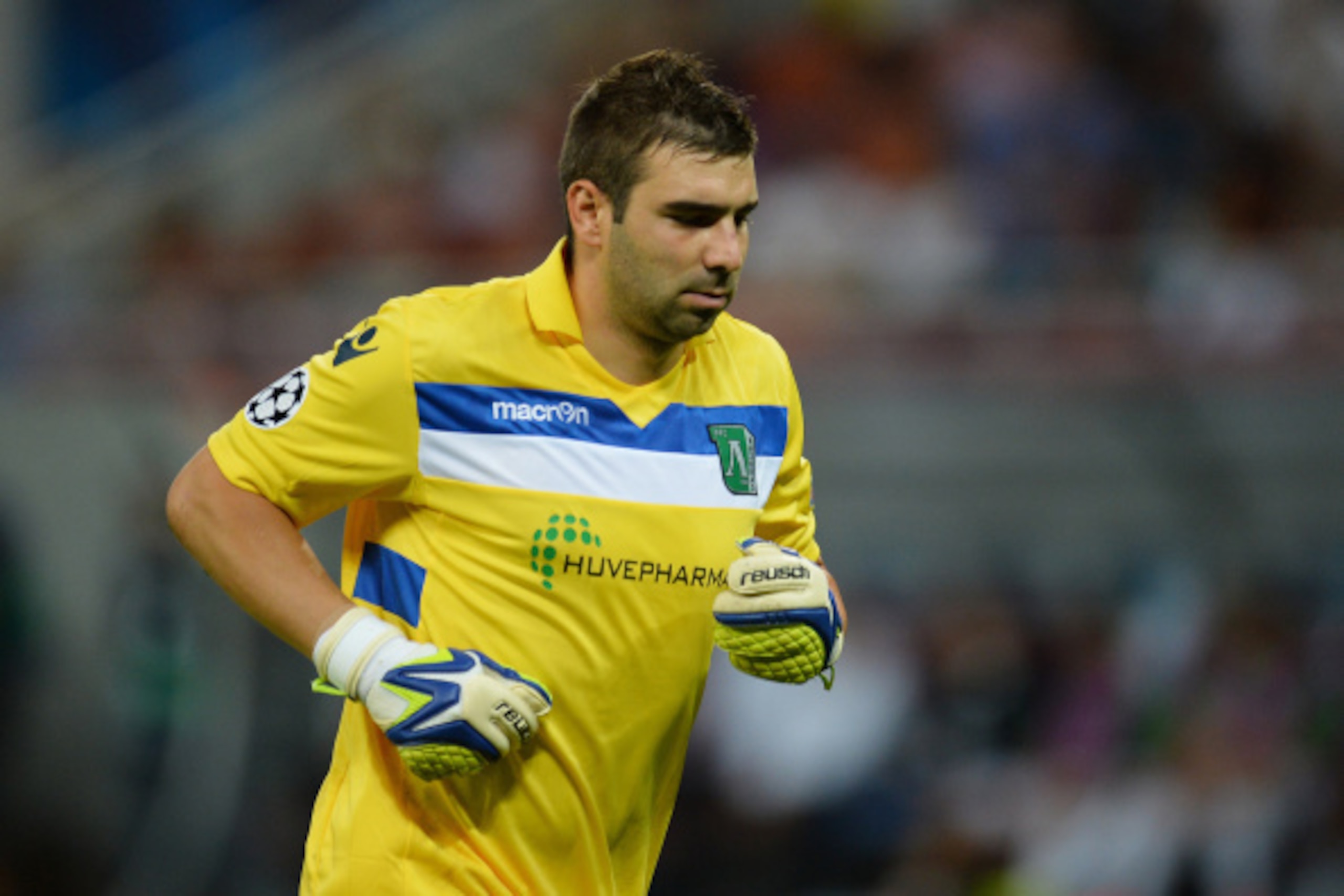 BUCHAREST,ROMANIA - AUGUST 19: Goalkeeper Vladislav Stoyanov of PFC Ludogorets Razgrad in action during the UEFA Champions League first leg play-off match against between FC Steaua Bucuresti  and PFC Ludogorets Razgrad on August 19, 2014 in Bucharest,Roma