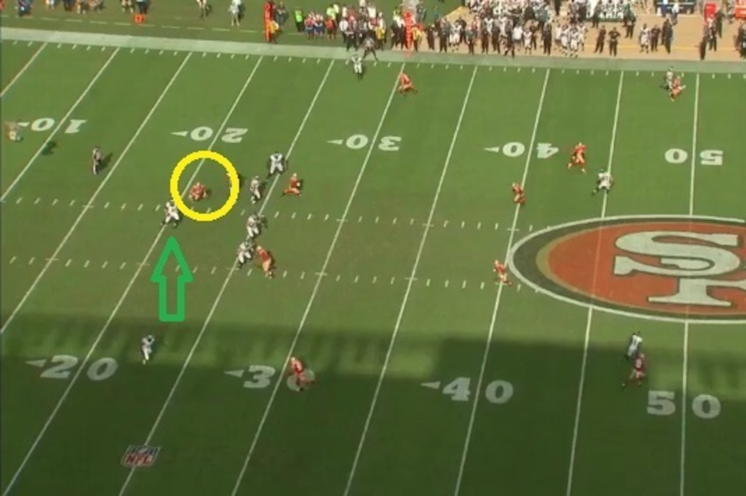 Feeling the pressure from Smith, Foles is forced to deliver the ball early and takes a hit in the process.