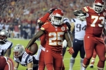 Sep 29, 2014; Kansas City, MO, USA; Kansas City Chiefs running back Jamaal Charles (25) celebrates after scoring a touchdown against the New England Patriots in the first half at Arrowhead Stadium. Mandatory Credit: John Rieger-USA TODAY Sports