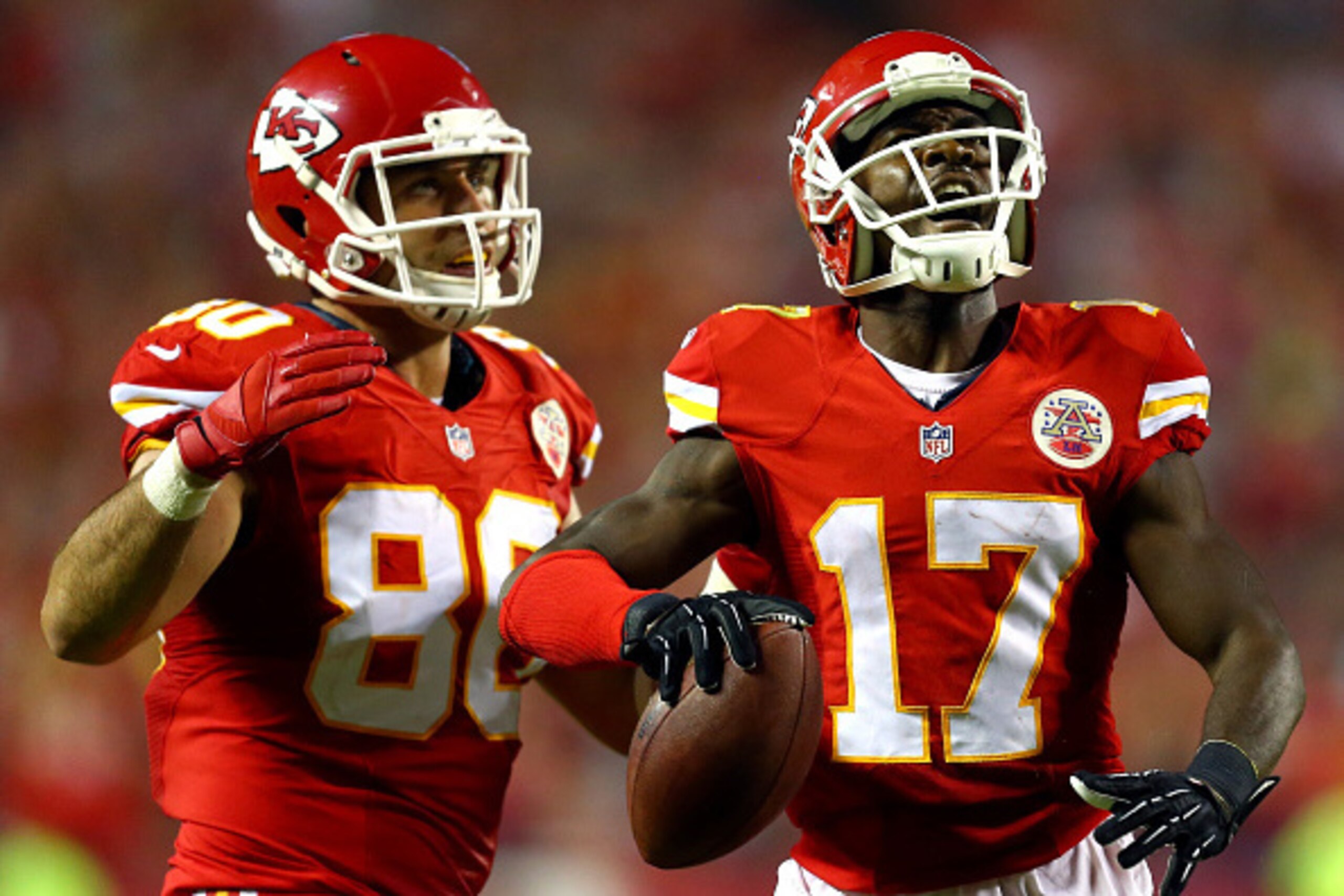 KANSAS CITY, MO - SEPTEMBER 29:   Donnie Avery #17 of the Kansas City Chiefs celebrates scoring a touchdown with  Anthony Fasano #80 of the Kansas City Chiefs against the New England Patriots at Arrowhead Stadium on September 29, 2014 in Kansas City, Miss