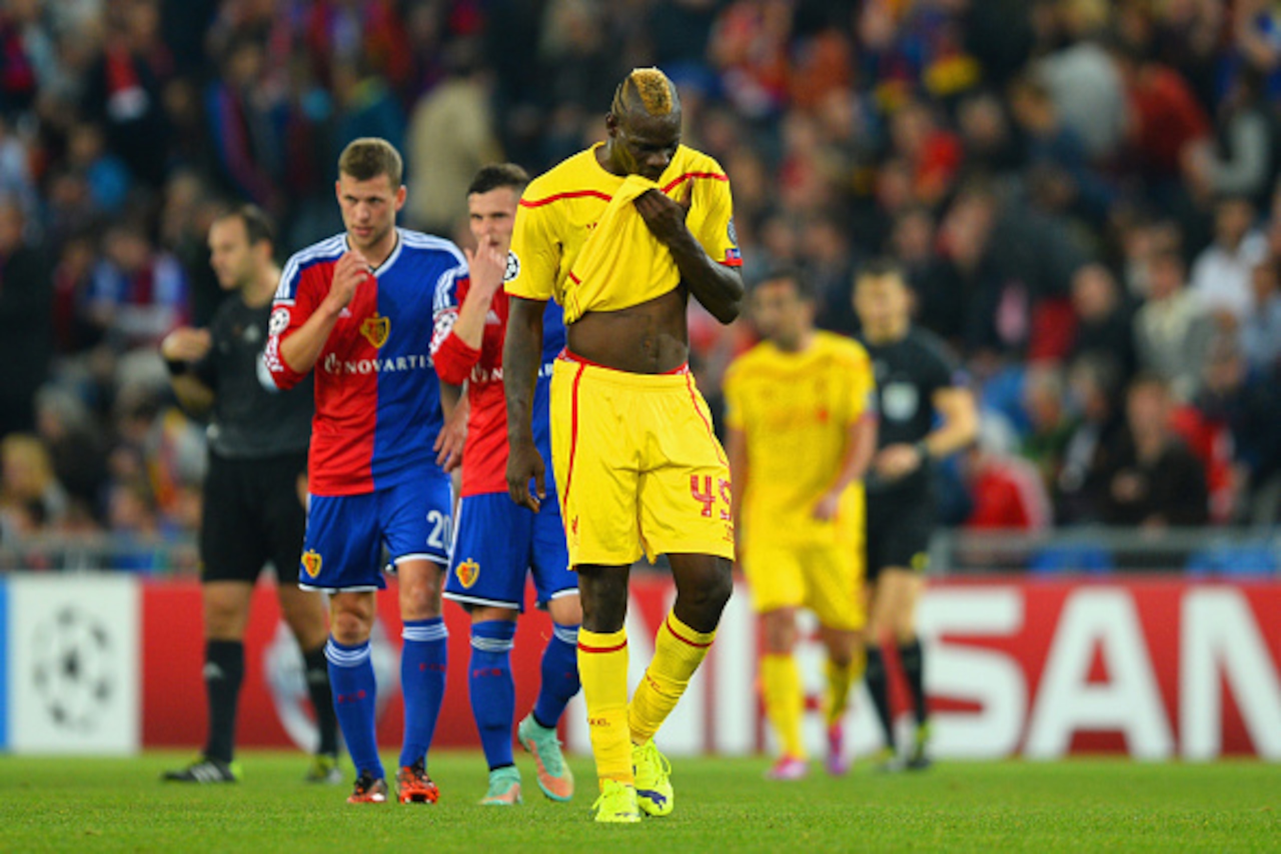BASEL, SWITZERLAND - OCTOBER 01:  A dejected Mario Balotelli of Liverpool at the end of the match during the UEFA Champions League Group B match between FC Basel 1893 and Liverpool FC at St. Jakob Stadium on October 1, 2014 in Basel, Switzerland.  (Photo 