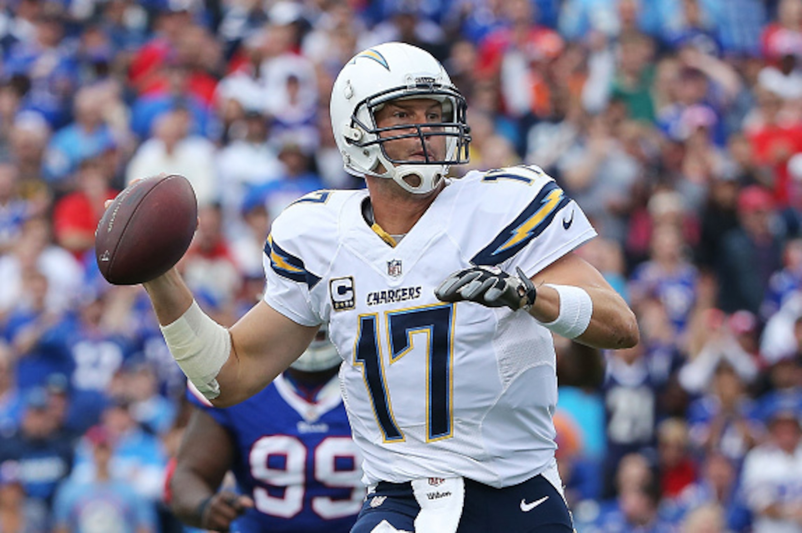 ORCHARD PARK, NY - SEPTEMBER 21:  Philip Rivers #17 of the San Diego Chargers throws against the Buffalo Bills during the first half at Ralph Wilson Stadium on September 21, 2014 in Orchard Park, New York.  (Photo by Tom Szczerbowski/Getty Images)